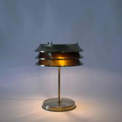Lampada in ottone di Kari Ruokonen