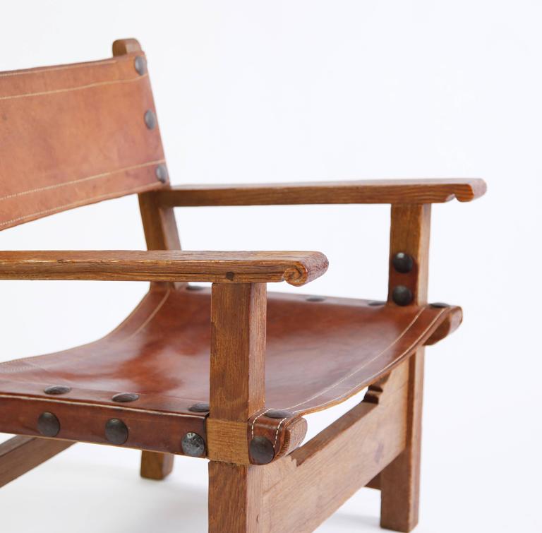 20th Century Spanish Oak and Saddle Leather Armchairs For Sale
