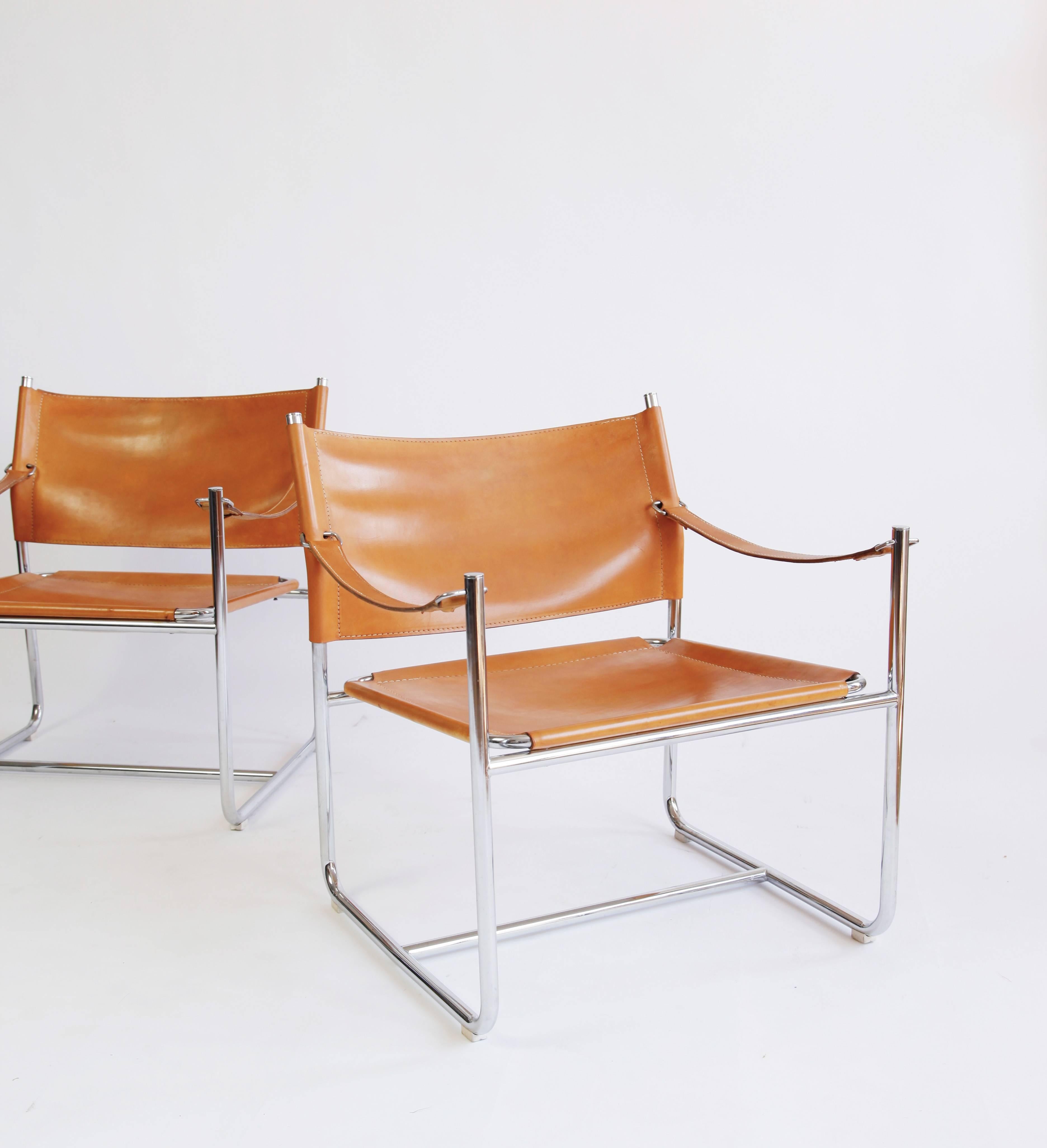 A streamlined pair of leather lounge chairs by Swedish designer Karin Mohbring.