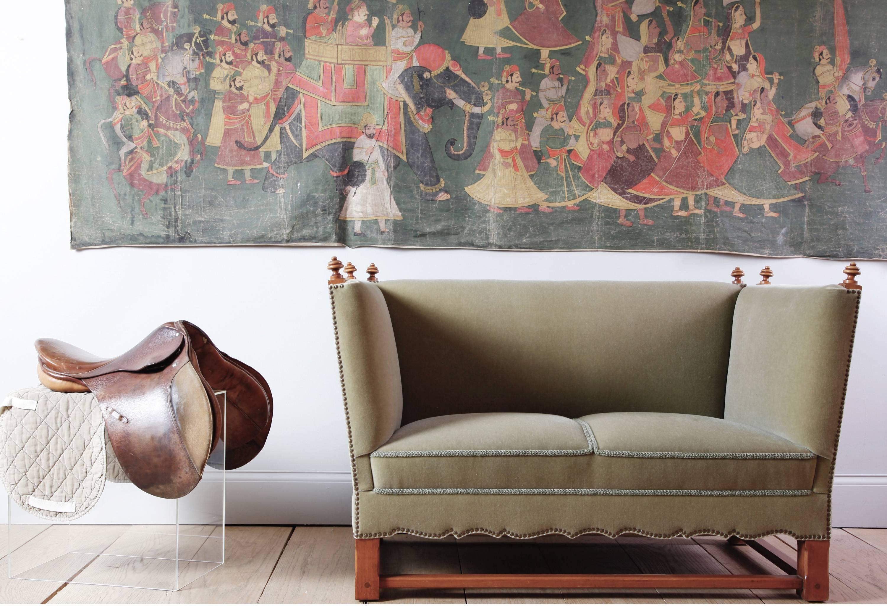 Elias Barup was the first furniture designer for Gärsnäs AB in Sweden. This fantastic settee, which dates from the beginning of his tenure there in the 1930s, is probably modeled on the Classic British Knole settee, though the arms are not