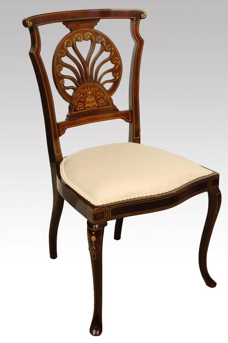 Late Victorian set off six mahogany chairs the backs having fan shaped inlaid splat above upholstered seat raised up on slender cabriole front leg supports
Dimensions:

Measures: Height 33 inches height to seat 15.5 inches,

width 16.5