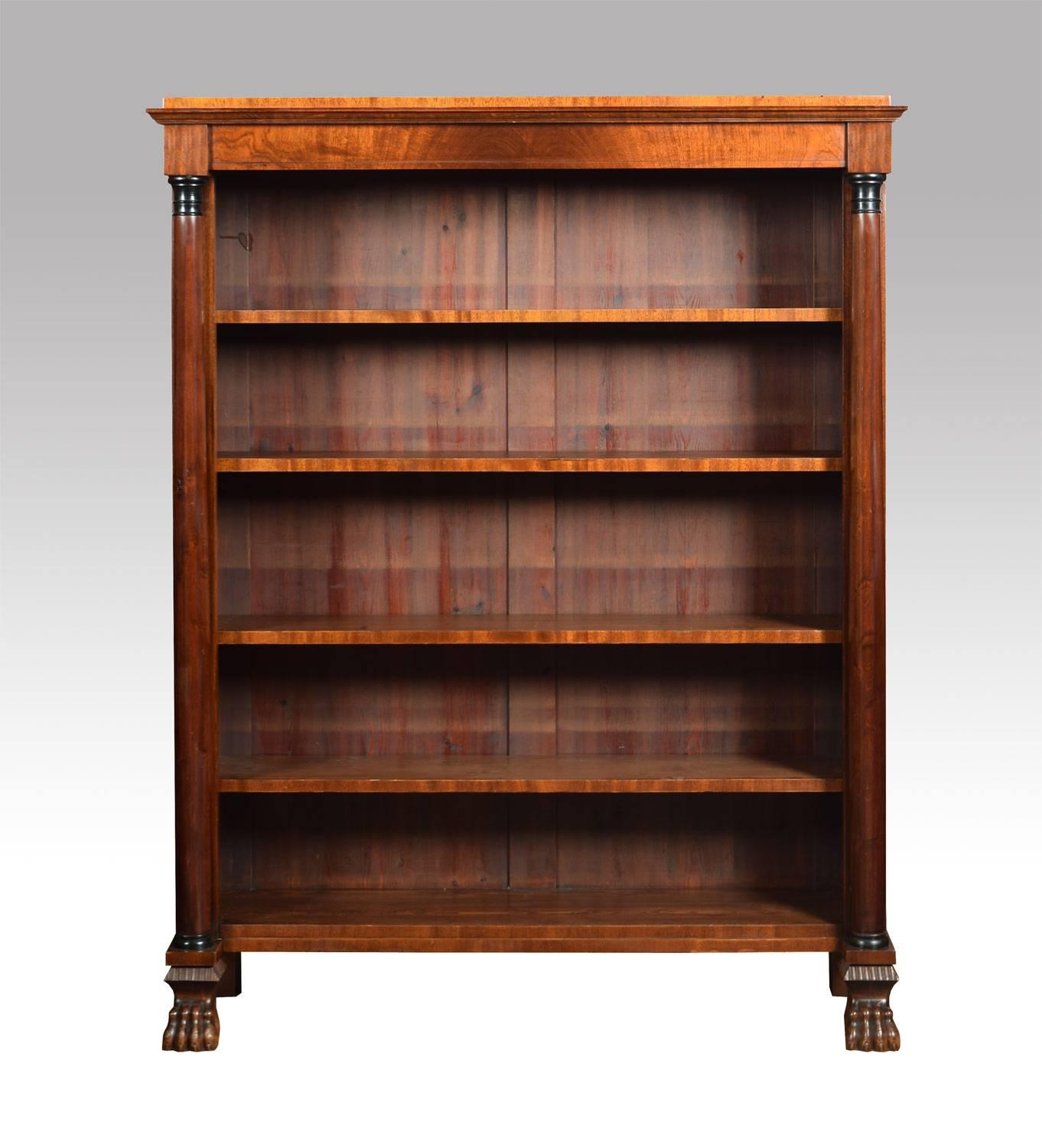 Pair of French Empire style mahogany open bookcases the rectangular tops supported by turned columns with ebony capitals, each bookcase having four adjustable shelves. All raised up on claw feet.

Dimensions:

Height 59.5 inches,

width 47.5