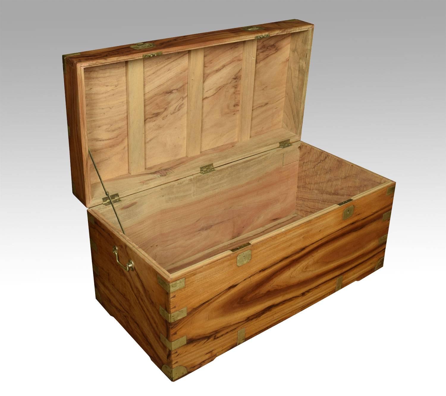 Chinese export brass-bound camphorwood chest The large rectangular hinged top opening to reveal large storage area with brass straps and side-carrying handles 

Dimensions 

Height 20 inches ,

width 42 inches ,

depth 20.5 inches.


 