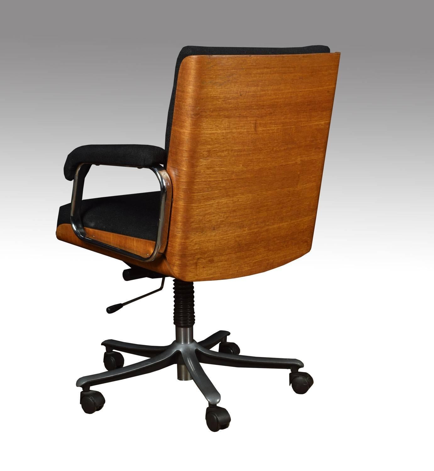 Eames style swivel office chair, the black upholstered back, seat and arms on bentwood frame with chromed metal swivel base

Dimensions
Height 37 Inches, height to seat 21 Inches
Width 25.5 Inches
Depth 25 Inches.