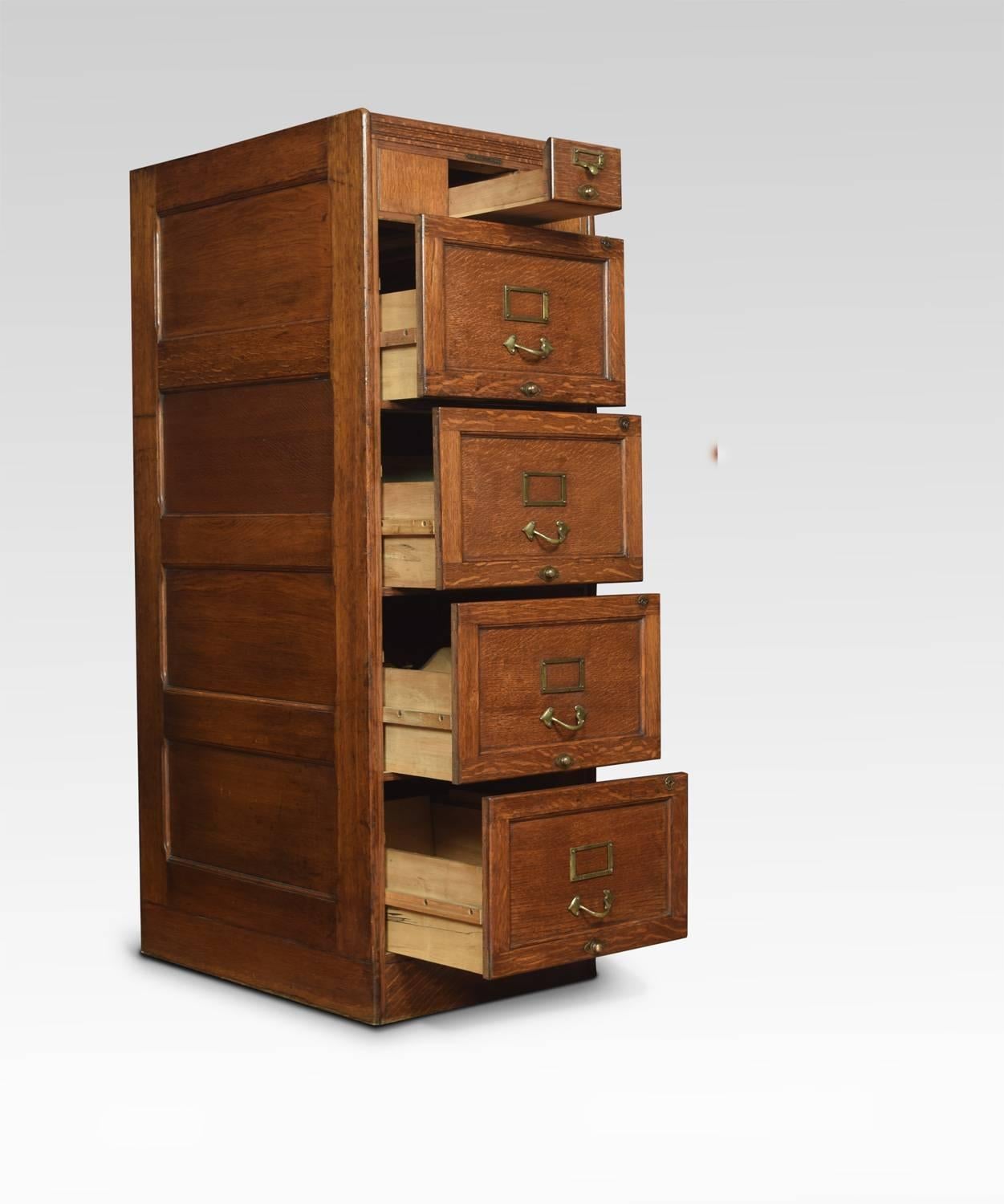 Edwardian solid oak filing cabinet, having square top with plaque inscribed William Barlow office furnishers west Hartlepool, to the single short draw above four larger drawers, all draws run freely and have the period brass handles and name plates.