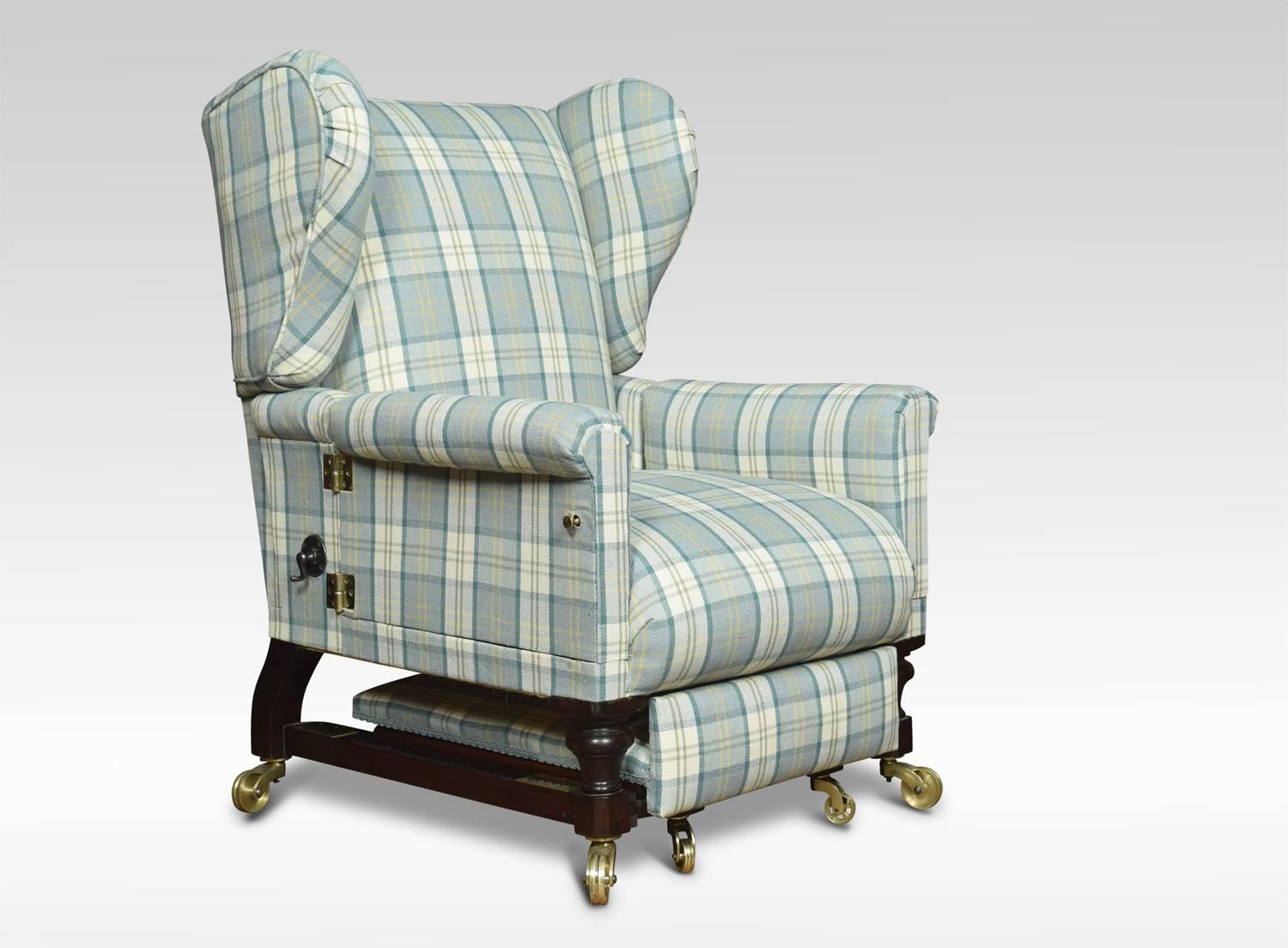 19th century wing armchair, the shaped reclining back above large movable arm rests, leading down to fully adjustable stool, Upholstered in tartan fabric. Raised on four tuned legs terminating in large brass castors.
Dimensions:
Height 46 inches