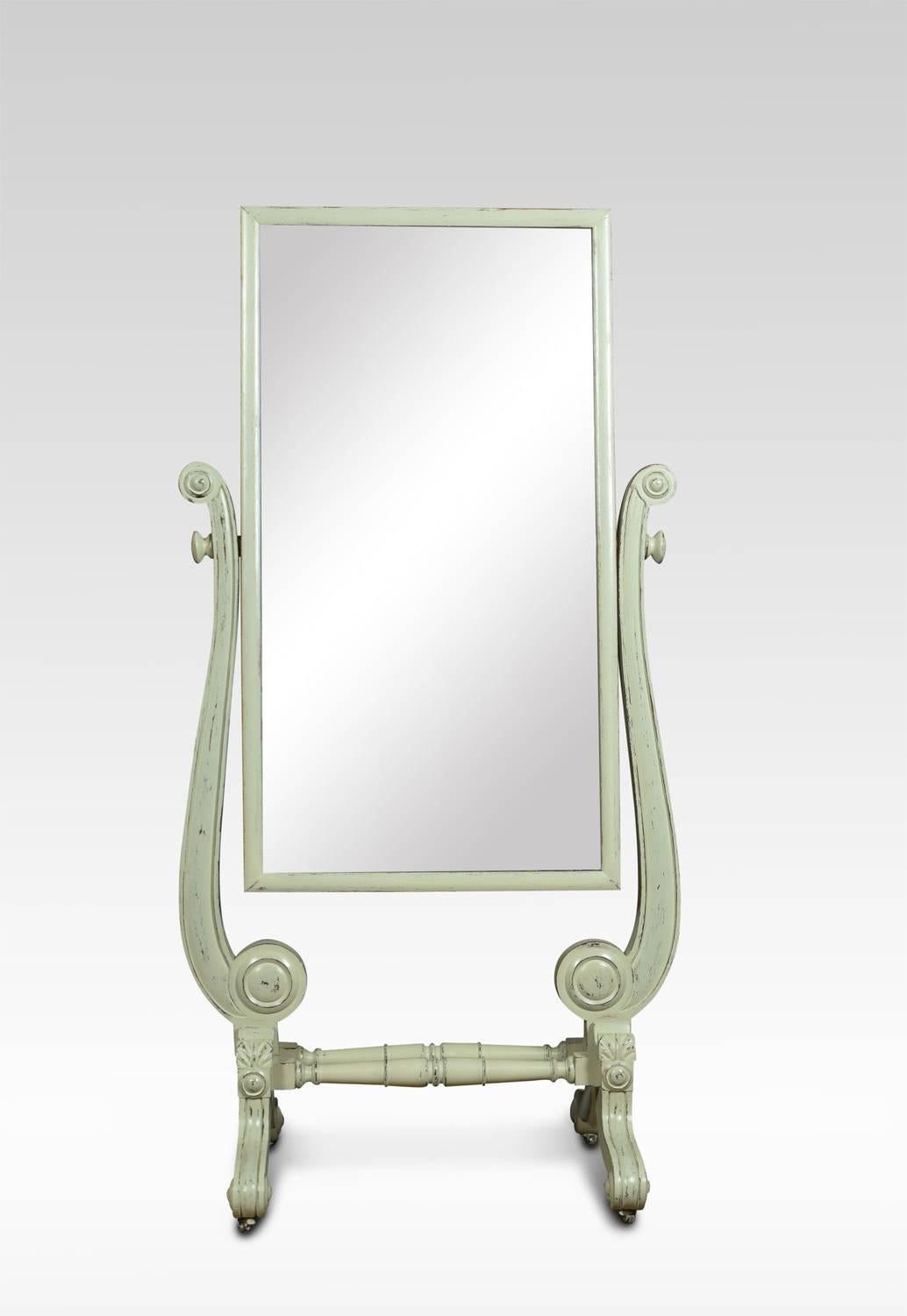 Regency painted cheval mirror, the original rectangular plate between shaped supports on scrolling feet with brass castors.

Dimensions
Height 62 inches
width 32 inches
depth 22.5 inches.