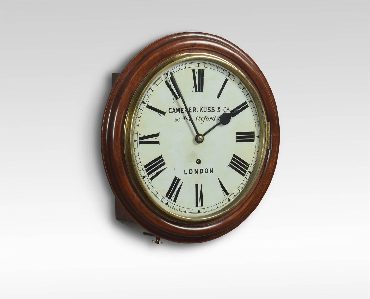 Mahogany wall clock, the circular case with glazed brass door to the painted 12 inch dial with Roman numerals, single fusee movement signed Camerer Kuss & Co London.
Dimensions
Diameter 16 inches
Depth 5 inches.