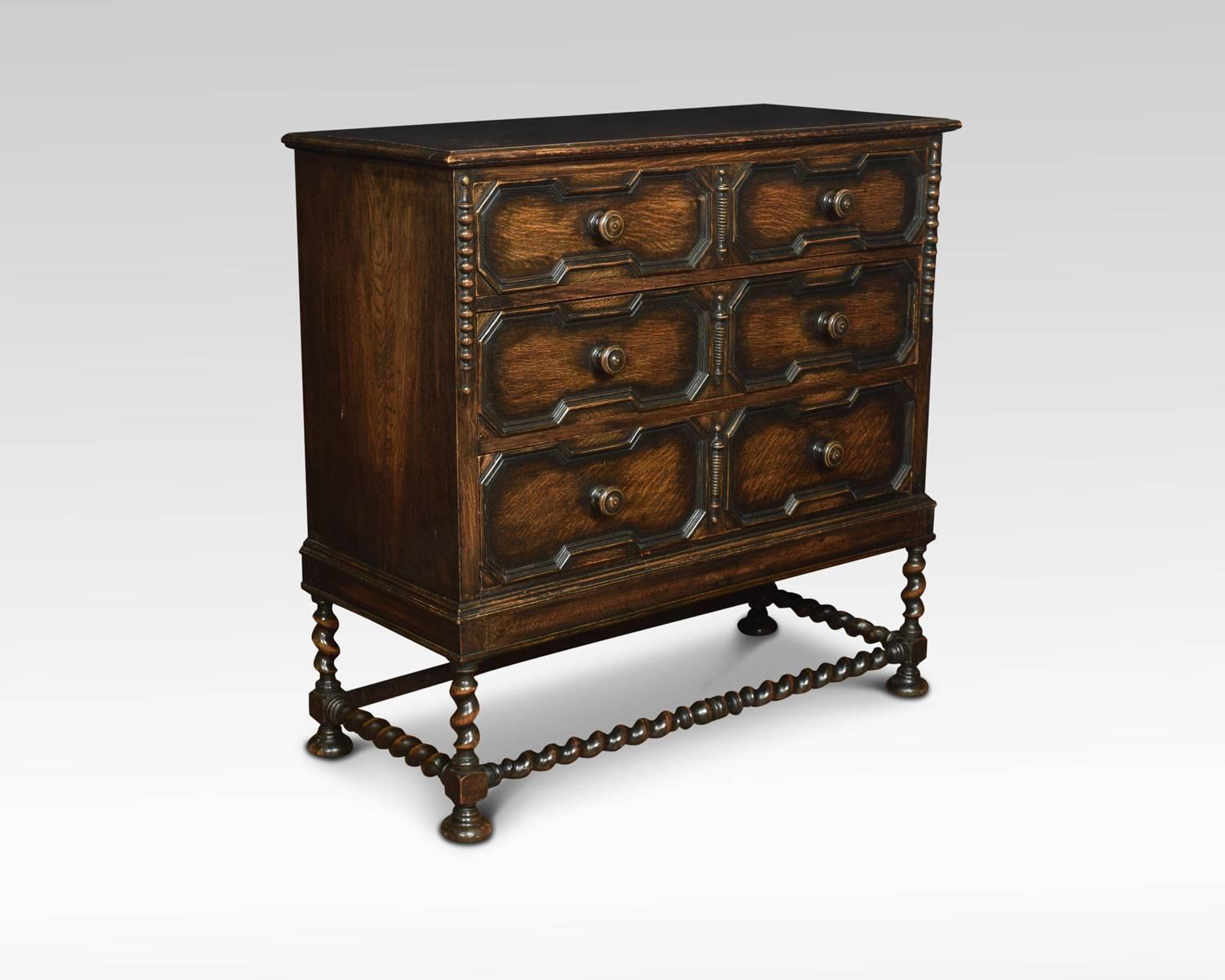 Early 20th century oak chest of Jacobean design, the large rectangular top with moulded edge above three graduated moulded drawers, flanked by split pilasters. All raised up on barley twist supports, terminating in bun feet.
Dimensions:
Height