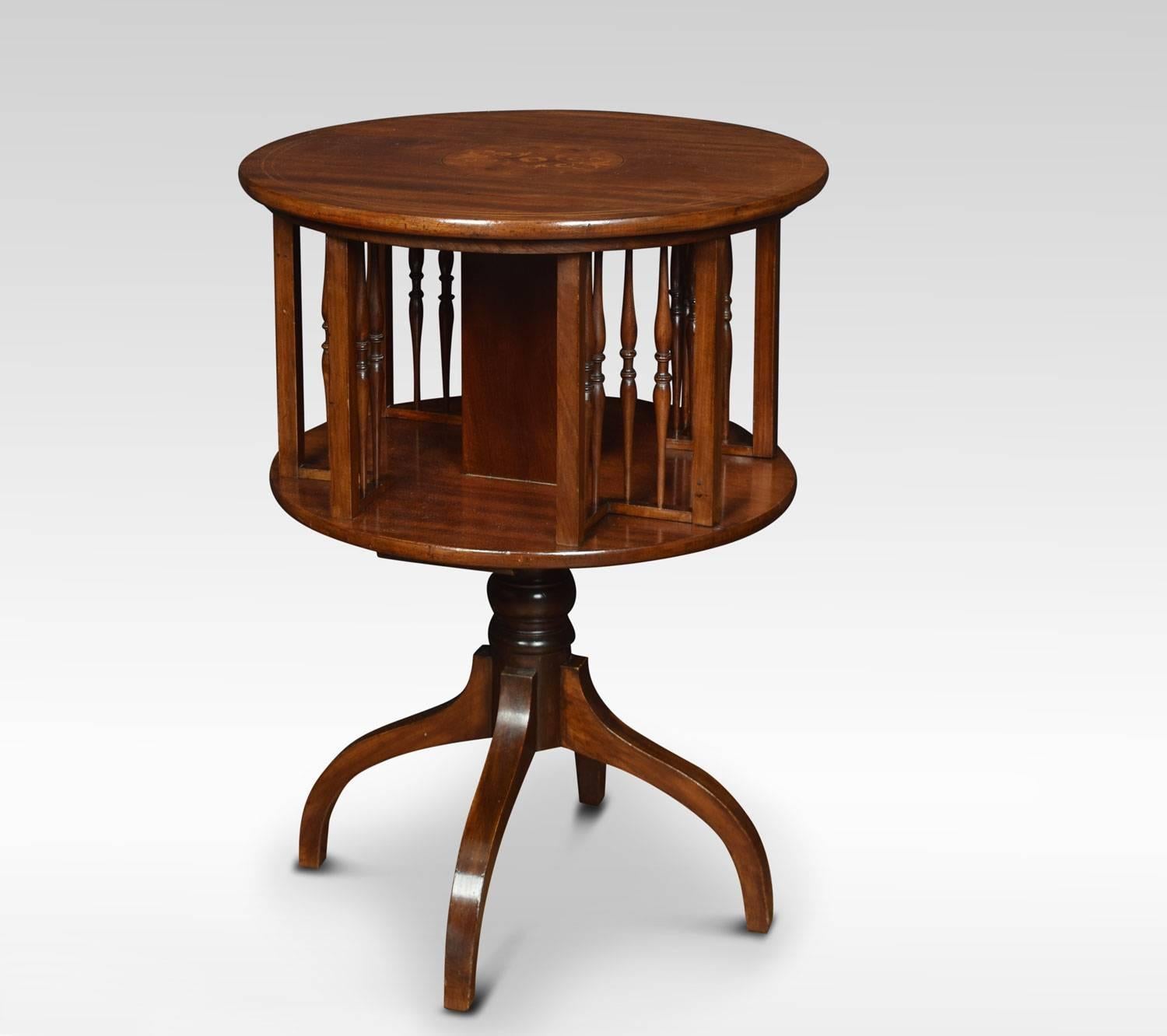 Edwardian mahogany revolving book table, the circular inlaid foliated top above spindle divides, raised on downswept legs.
Dimensions
Height 28.5 inches
Width 20.5 inches
Depth 20.5 inches.