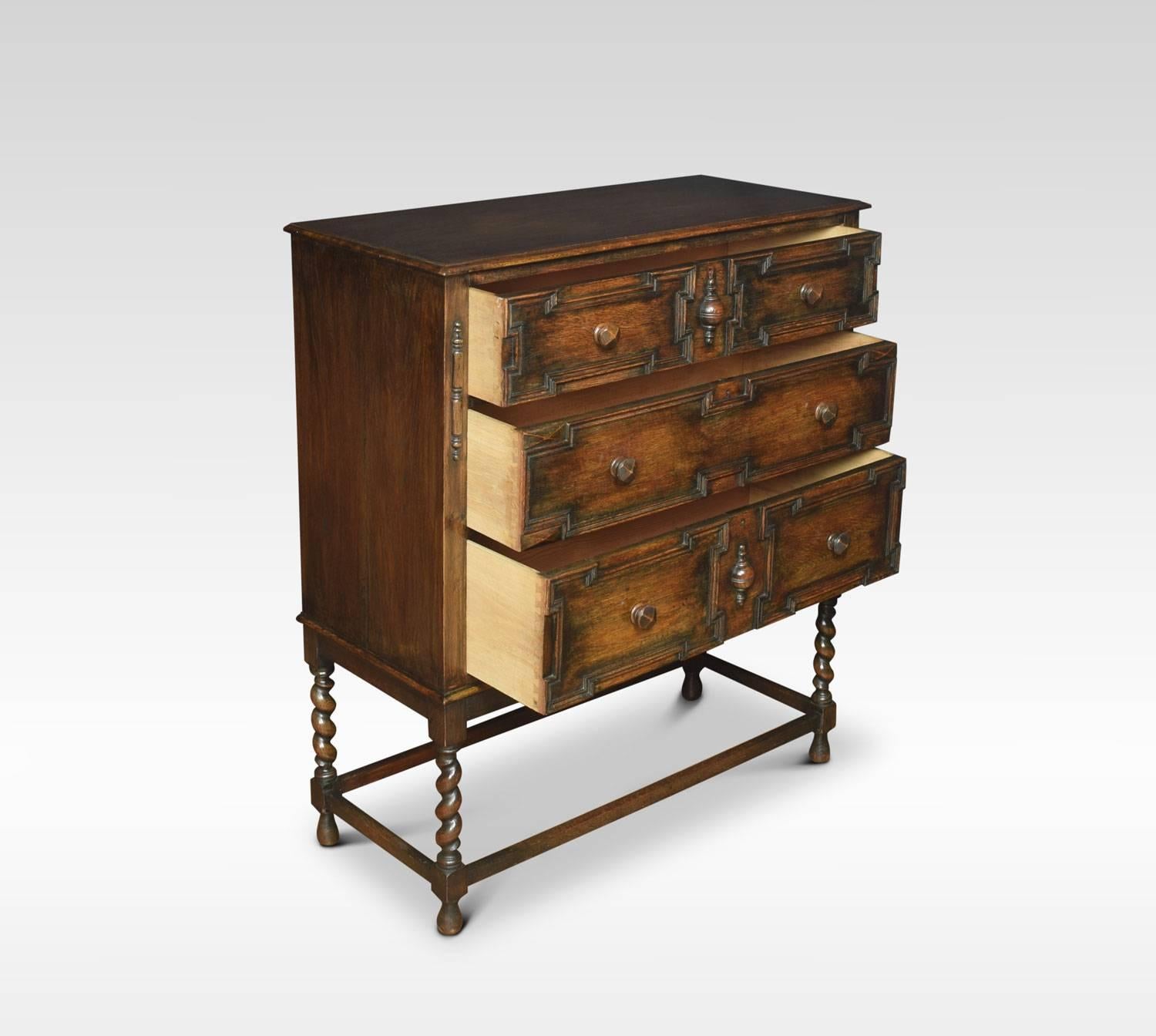 Early 20th century oak chest of Jacobean design, the large rectangular top with moulded edge above three graduated moulded drawers, flanked by carved pilasters. All raised up on barley twist supports united by stretchers.
Dimensions:
Height 47.5