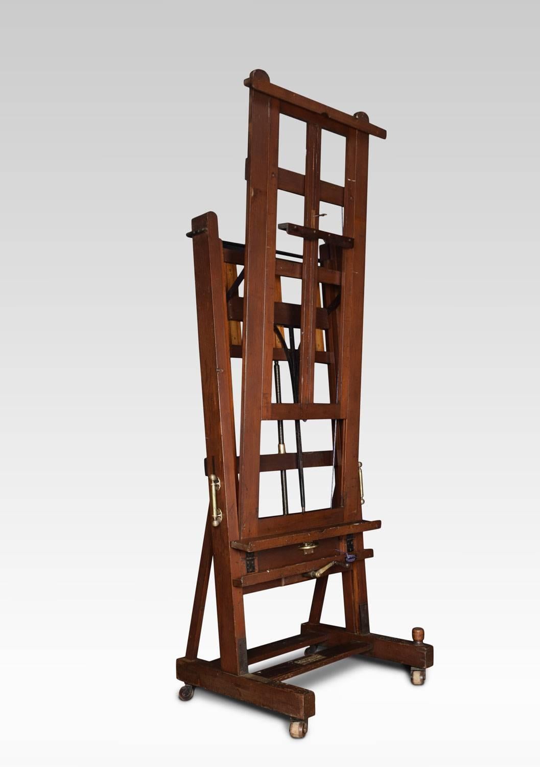 Large Windsor and Newton artist’s fully adjustable studio easel raised up on trestle base terminating in four lignum vitae casters.
Dimensions:
Height 96 inches when open 159 inches
Width 40.5 inches
Depth 31.5 inches.