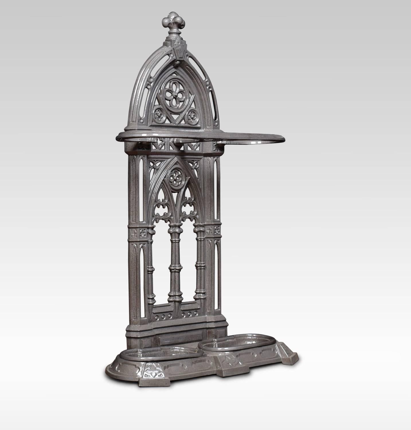 Cast iron stick or umbrella stand, the arched top above architectural pierced back, raised upon shaped base. With two original drip trays.
Dimensions:
Height 35.5 inches
Width 20.5 inches
Depth 9 inches.