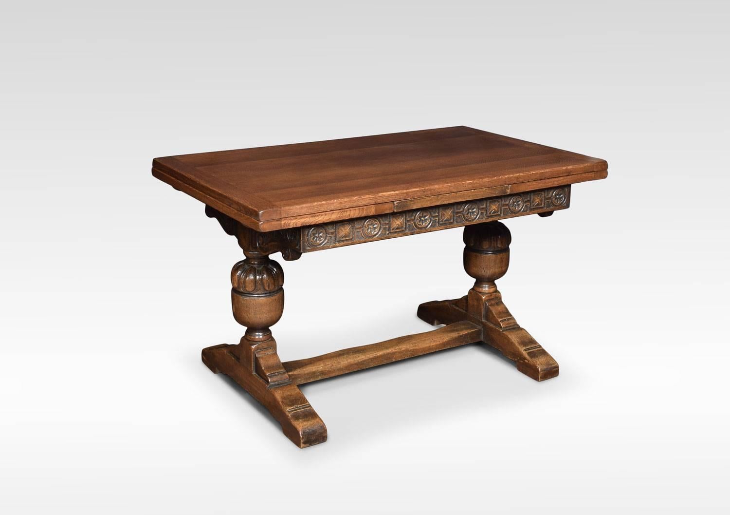 Oak draw leaf refectory table, the rectangular solid oak top above two pull-out ends. To the carved freeze raised on lobed carved bulbous supports united by a stretcher.
Dimensions:
Height 31 inches
Length 54 when extended 90 inches
Width 32