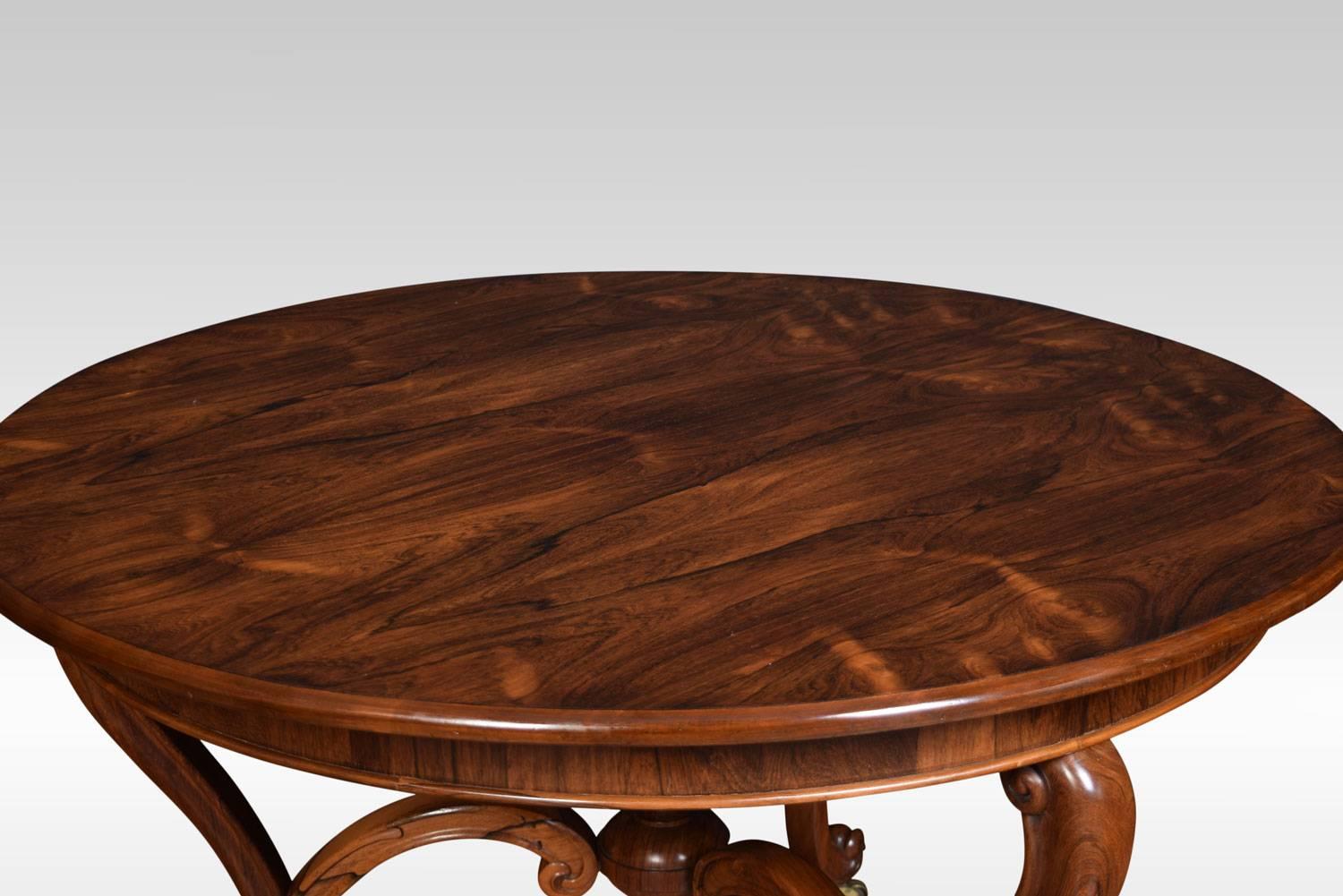 19th century rosewood centre table, the large circular top with moulded edge, raised on three scrolling legs united by carved stretchers. Terminating in original brass castors.
Dimensions:
Height 29.5 inches
Width 50.5 inches
Depth 50.5 inches.
