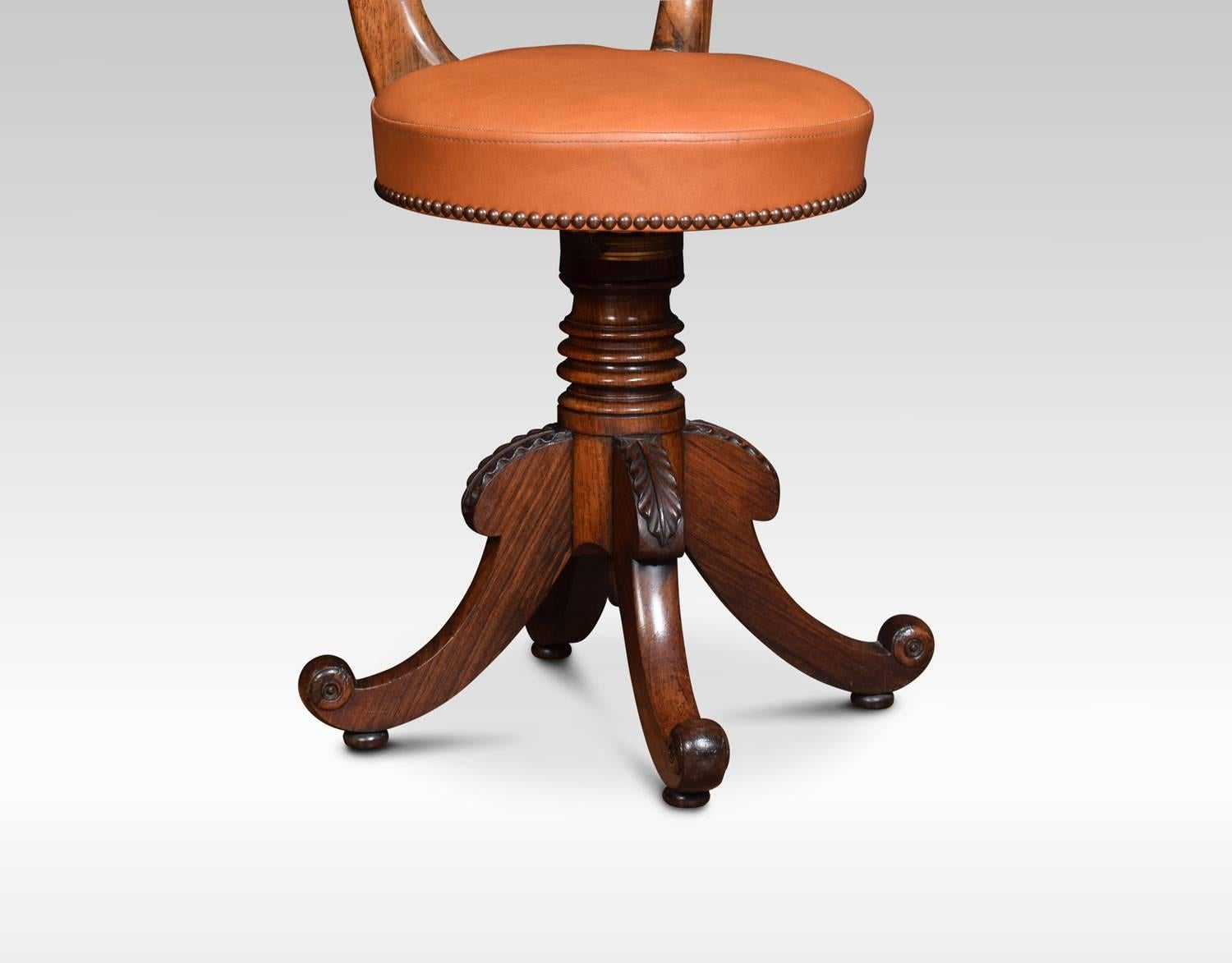 An early Victorian rosewood revolving dressing / music chair. The shaped back above circular leather upholstered seat. Raised up on four scrolling acanthus caped legs terminating in bun feet.
Dimensions:
Height 36 inches, height to seat 20