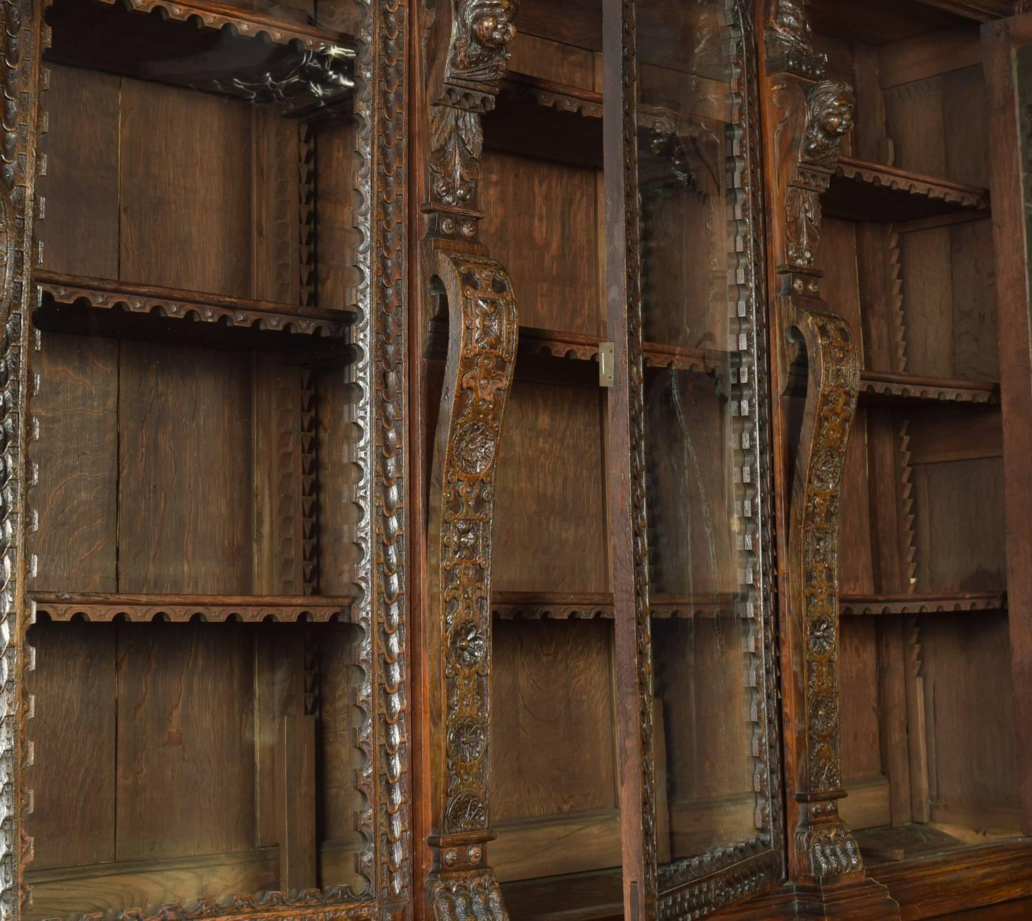 Large Renaissance Revival Carved Oak Three-Door Bookcase 4