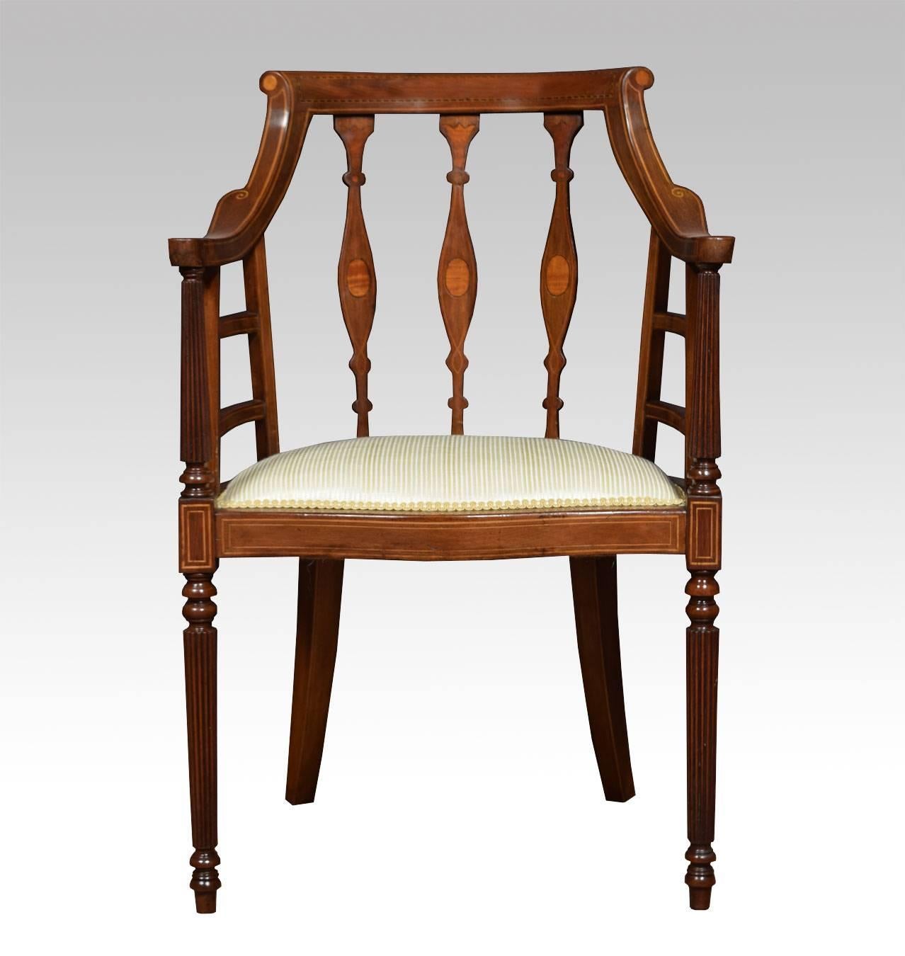 

Pair of Edwardian mahogany arm chairs the shaped back and raised arms having inlaid decoration to the splats above recently upholstered seat all raised up on tapered turned reeded front legs

Dimensions

Height 35.5 height to seat 18