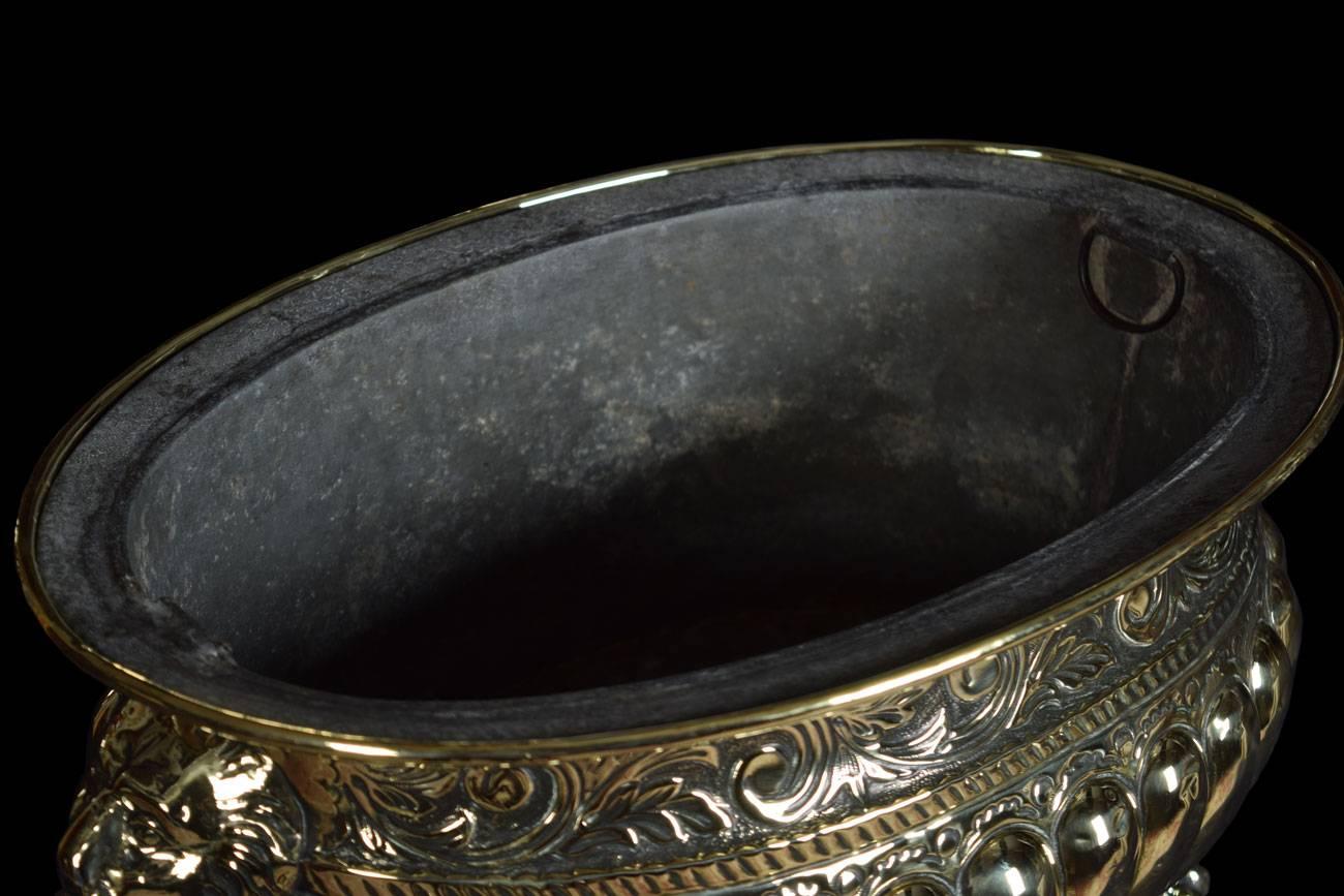 Dutch Brass Wine Cooler embossed with scroll and lobed panels, on paw feet, with original liner

Dimensions

Height 8 Inches

Width 16 Inches

Depth 11 Inches

 
