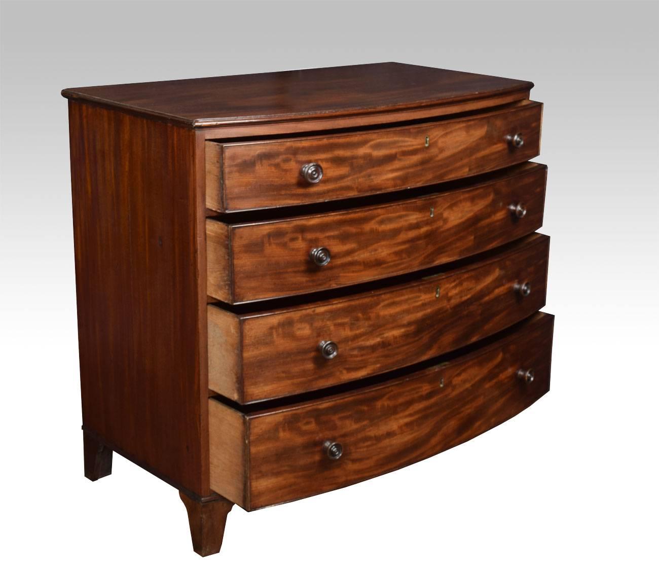 Regency mahogany bow fronted chest of draws the shaped top with moulded edge above four long graduated drawers with turned wooden handles and solid oak draw liners, all raised up on splayed feet.

Dimensions:

Height 39 inches.

Width 43