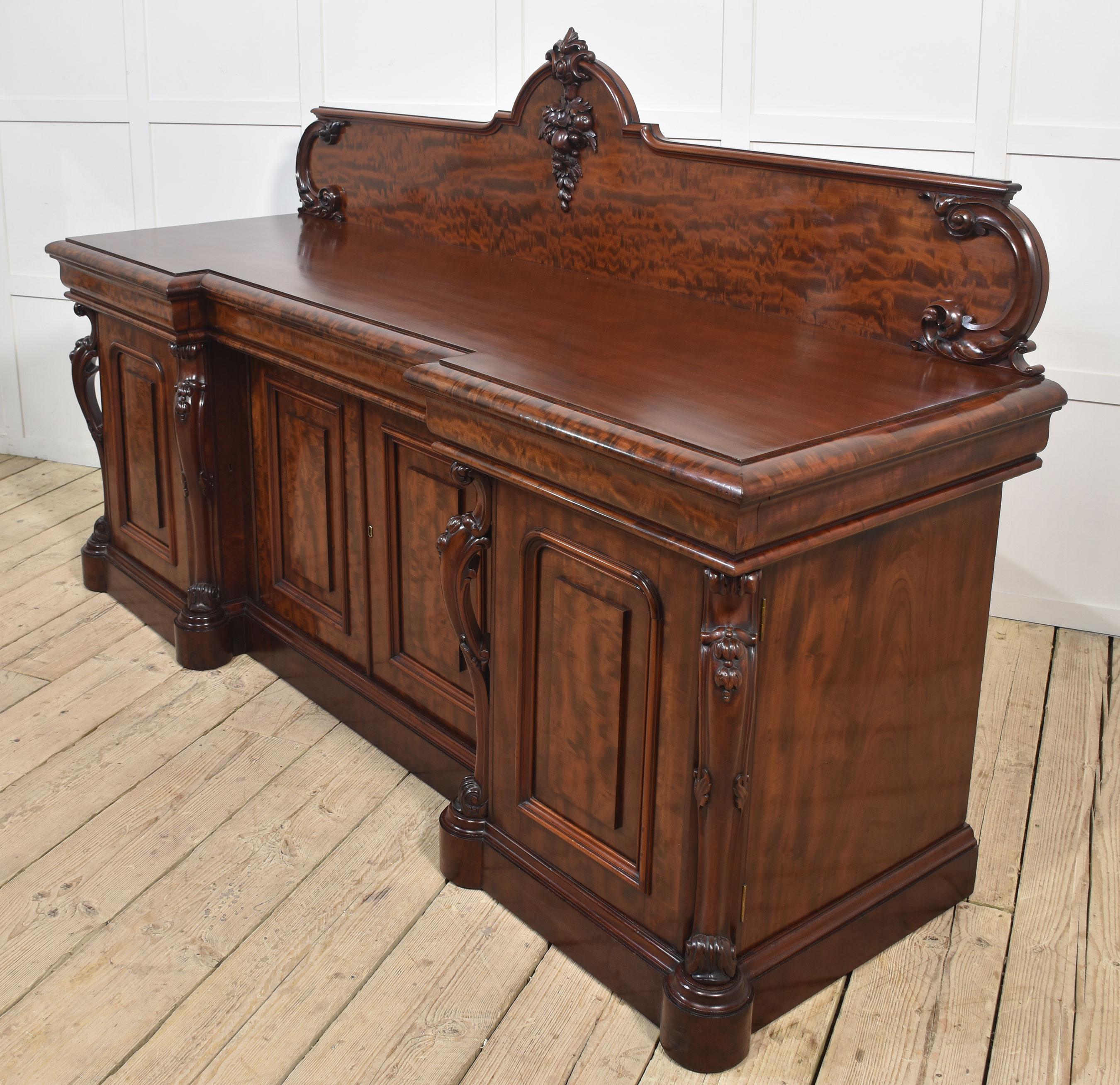 Large figured mahogany breakfront sideboard For Sale 1