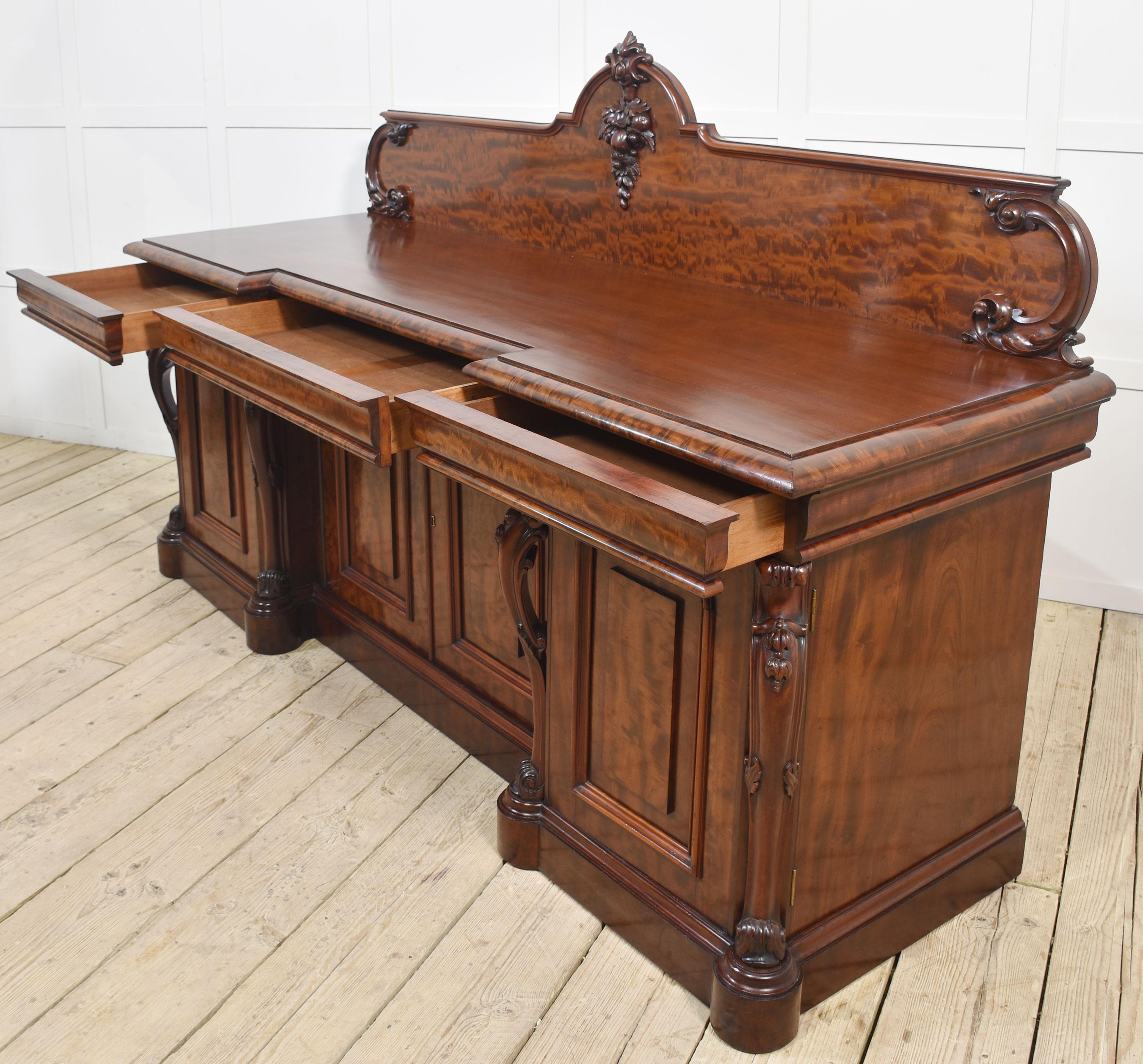 Large figured mahogany breakfront sideboard For Sale 4