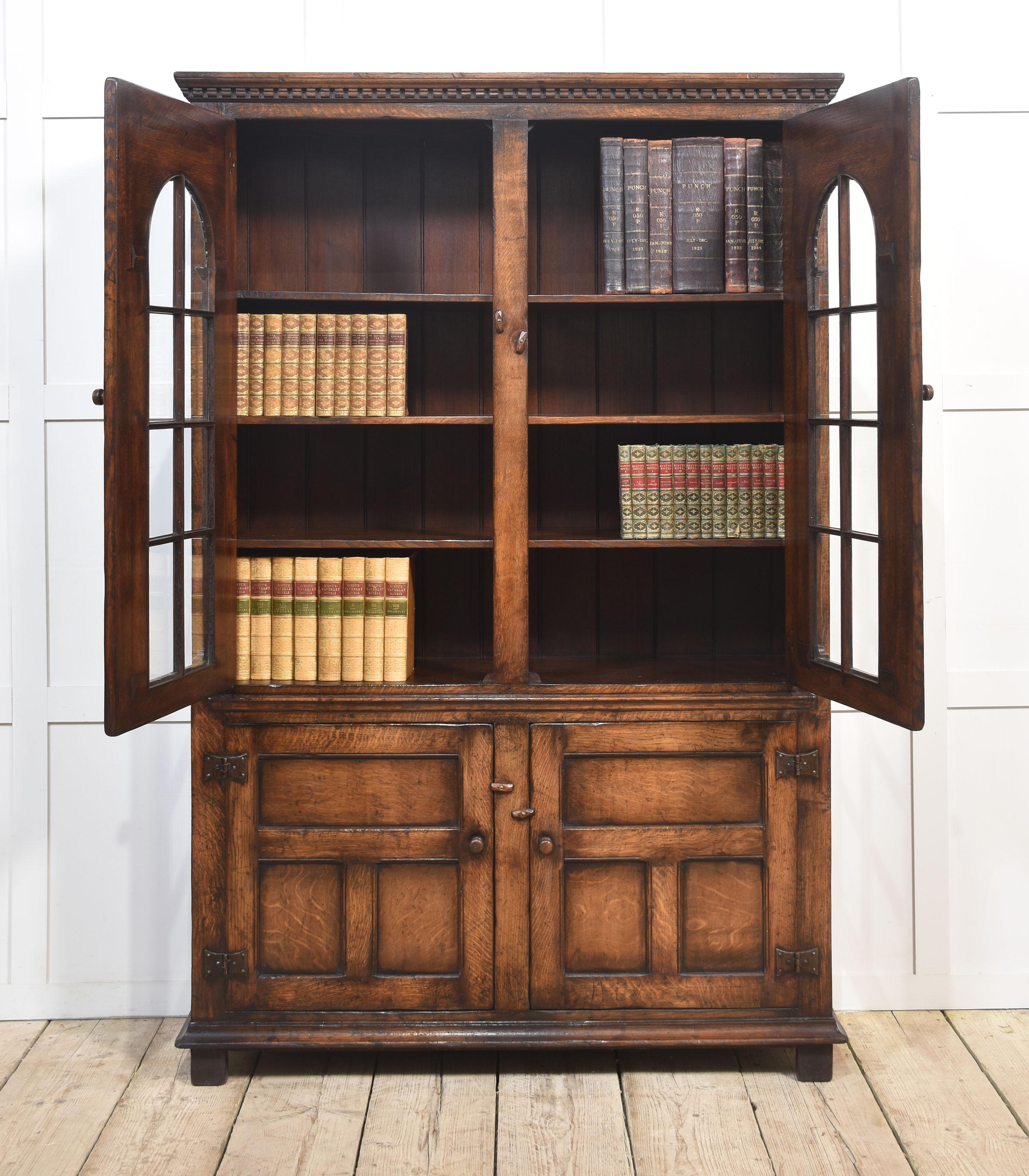 British Solid oak two door bookcase For Sale