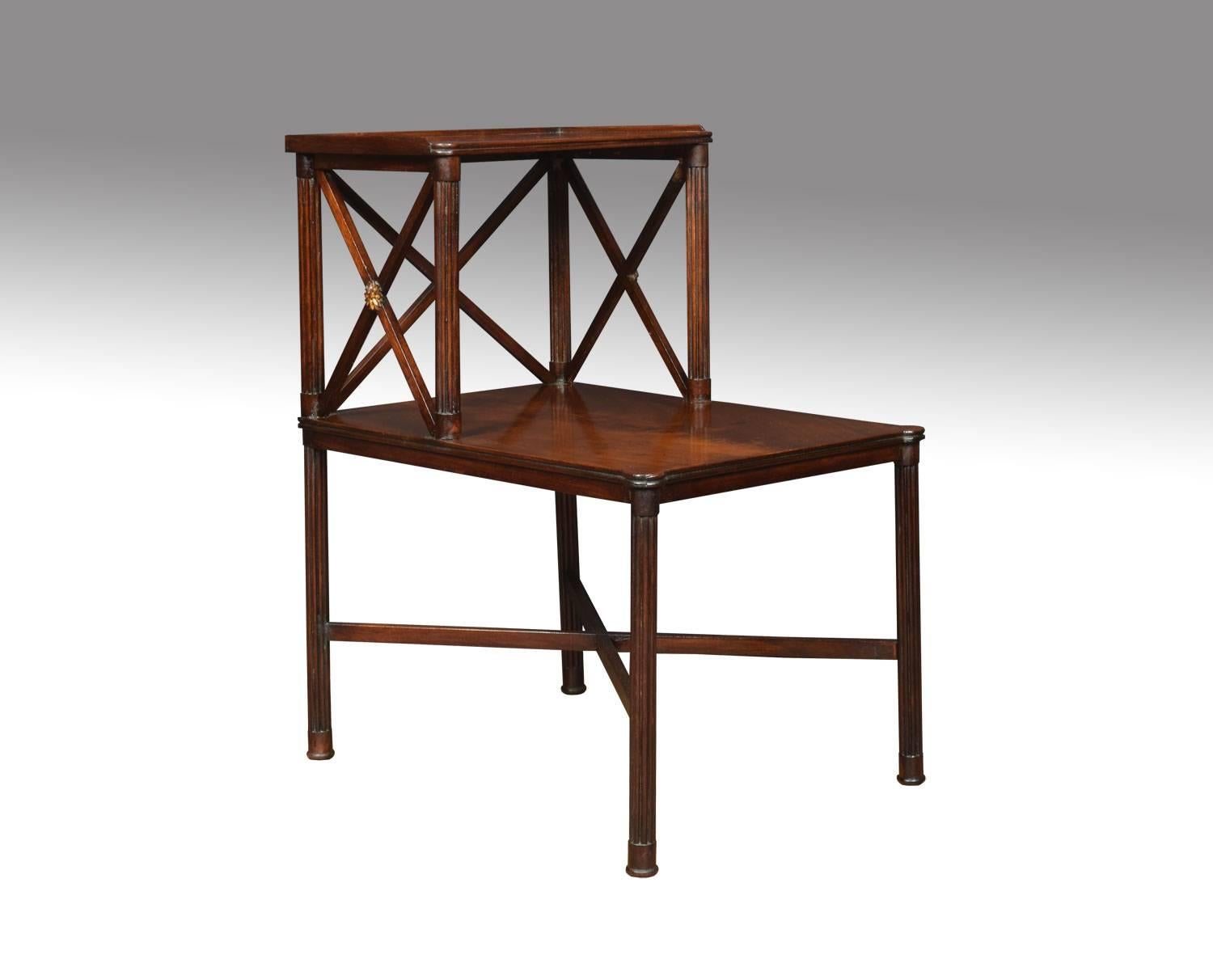 Pair of early 20th century Regency style side tables, the two-tier figured mahogany tops raised on reeded supports united by stretchers
Dimensions:
Height 27.5 inches
Width 16 inches
Depth 22.5 inches.