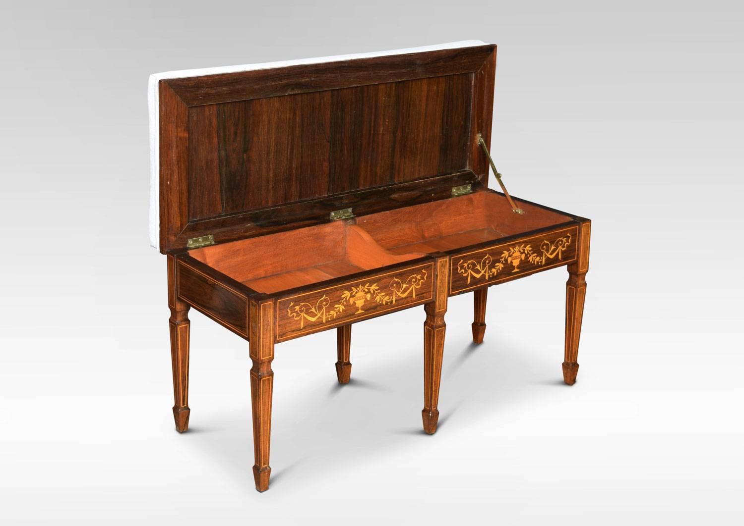 Rosewood inlaid duet piano stool, the rectangular French grey upholstered seat opening to reveal large storage area. To the freeze finely decorated in inlay, all raised up on six square tapering legs terminating in spade feet.
Dimensions
Height