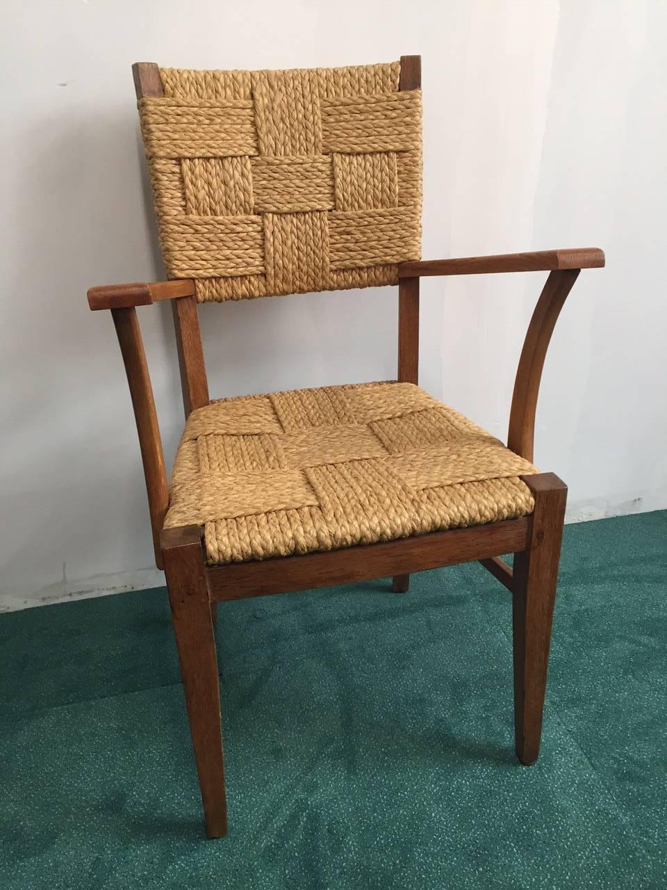 Pair of Audoux-Minet rope and oak armchairs.