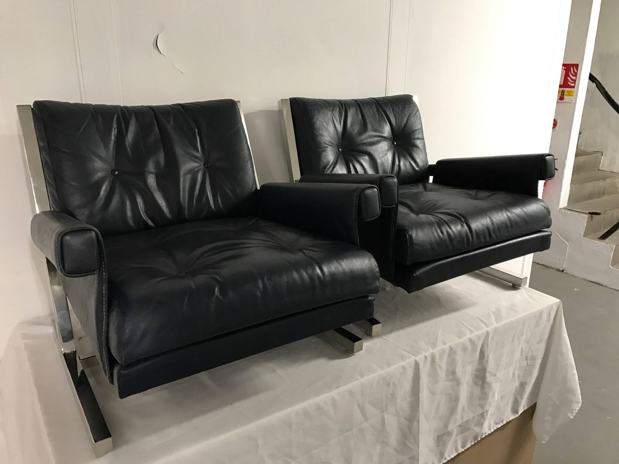Pair of metal and leather armchairs by Jacques Quinet, France, 1950s. 
Leather recently restored.