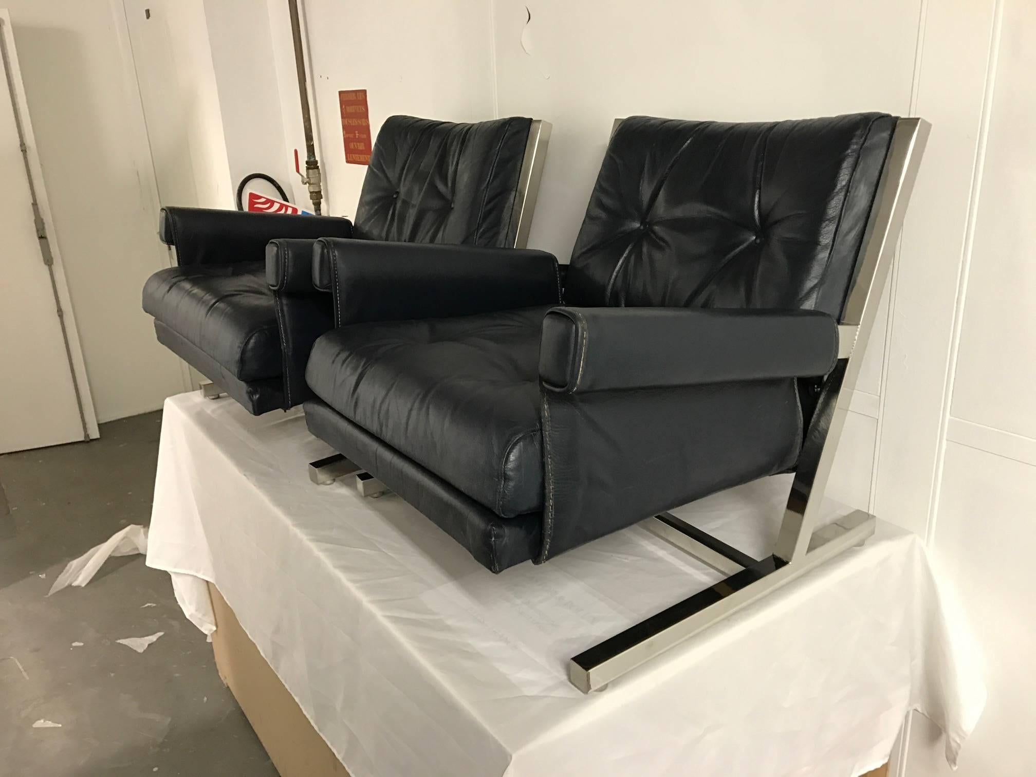 French Pair of Leather Armchairs by Jacques Quinet For Sale