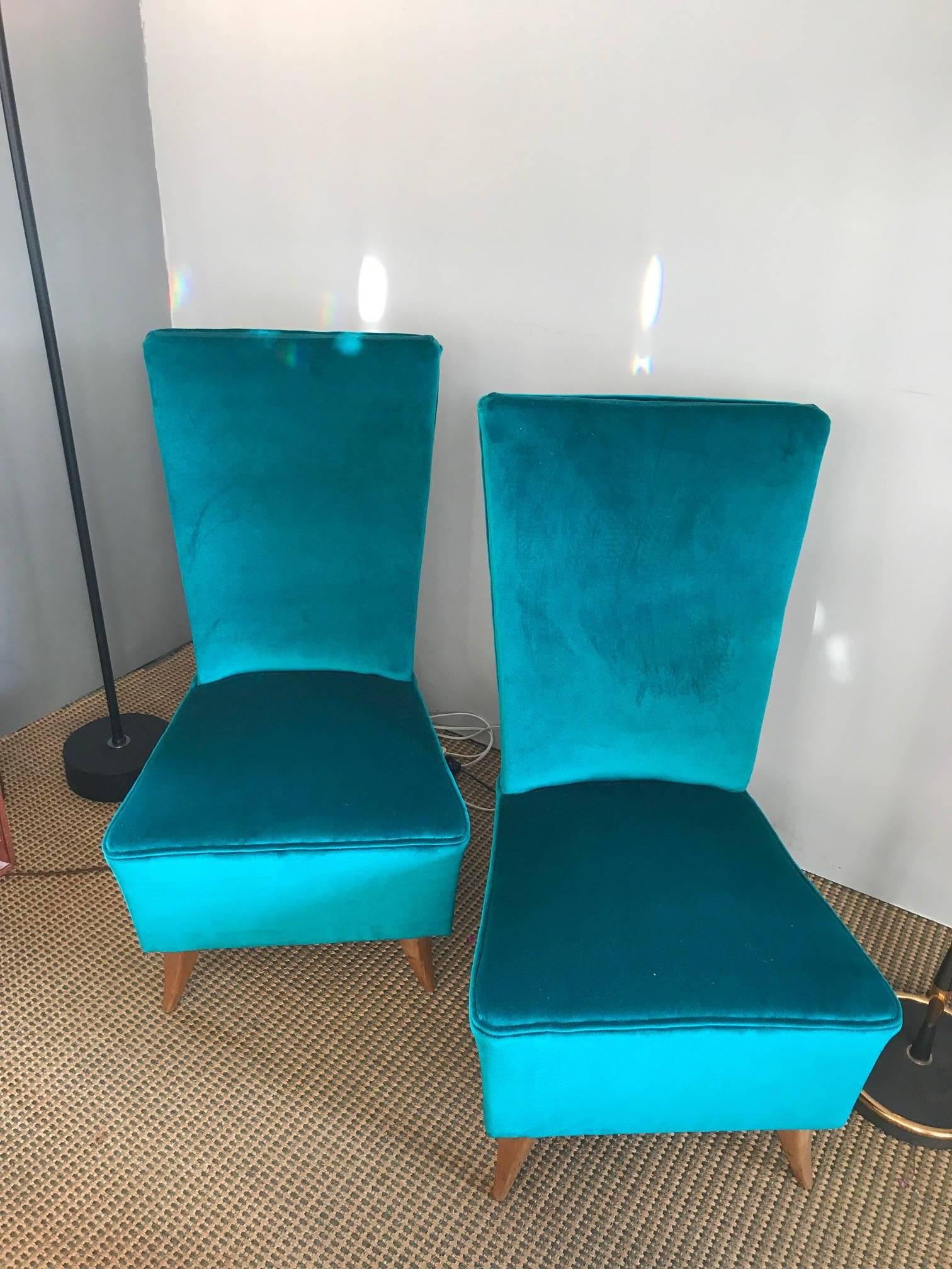 Pair of French 1940s slipper chairs, recently re-upholstered with a blue velvet.