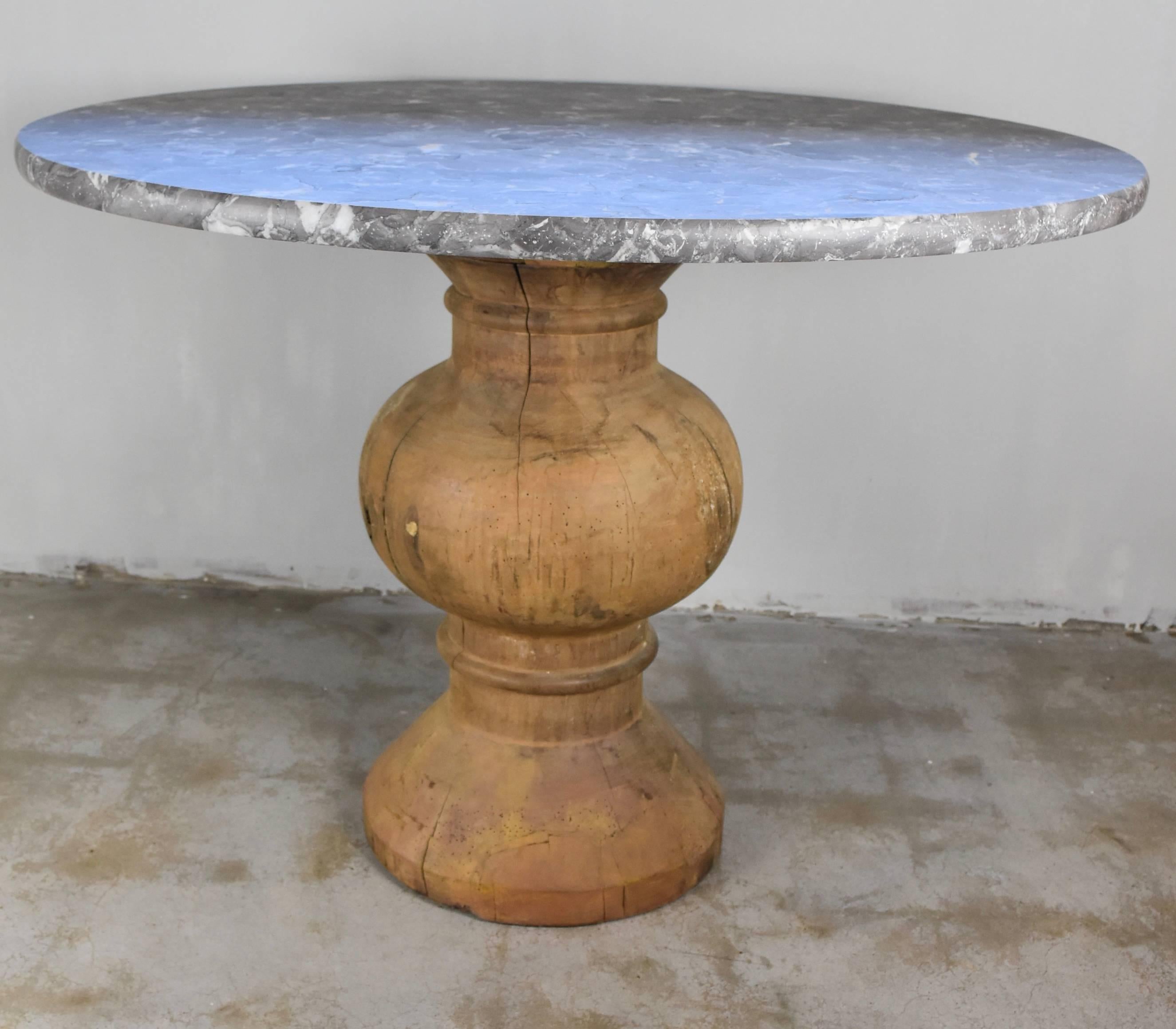This is to die for Pedestal table with belgian blue stone marble that is actually gray. It's from the 19th century purchased in France. It makes for a great entry table or breakfast table will seat 5 people.