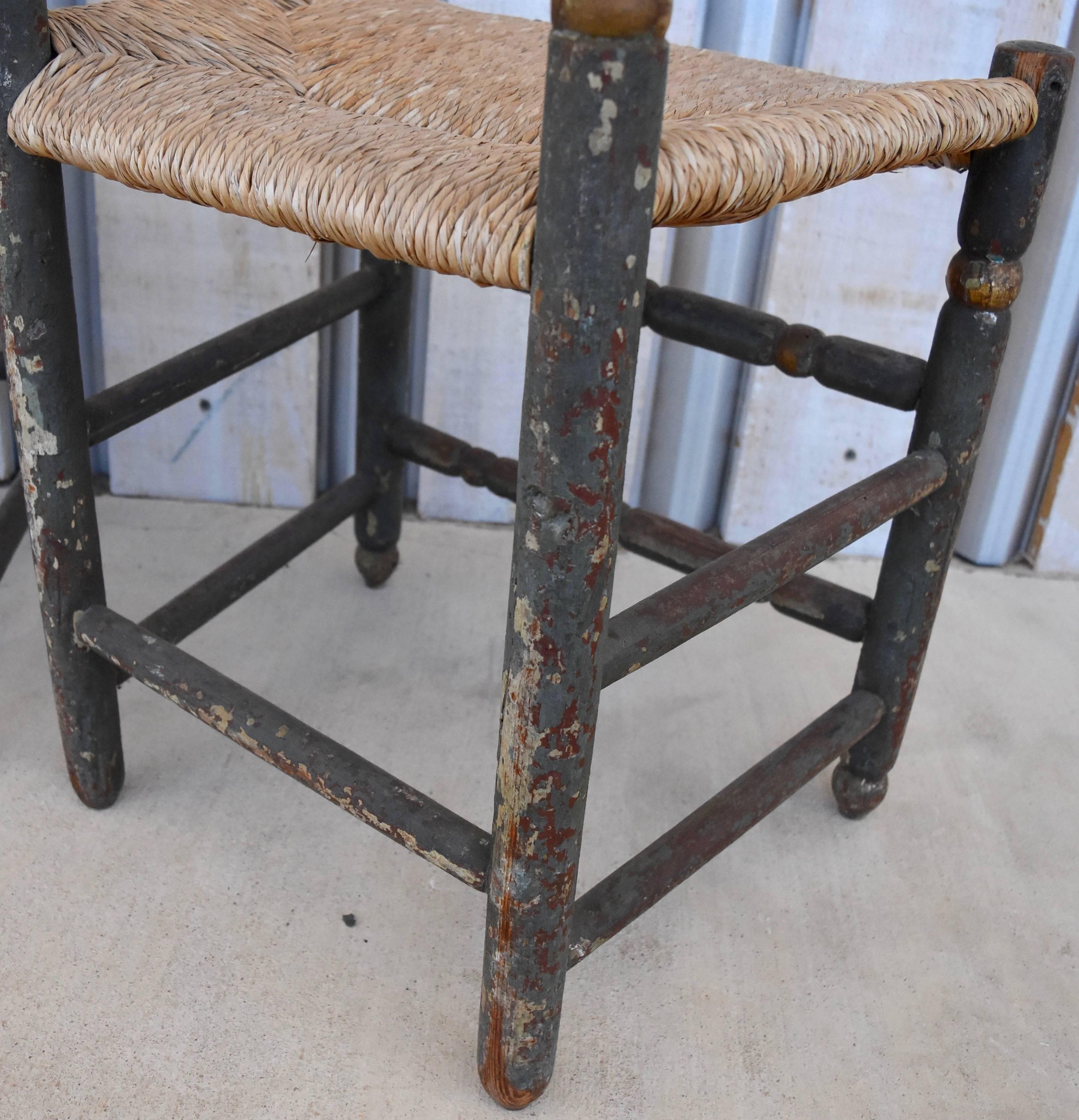 These set of six Italian chairs have the most beautiful teal paint I have ever had. You can see how richly worn the patina is in places and the rush seats are all in excellent condition. They are from the 19th century and have hints of gold gilt on