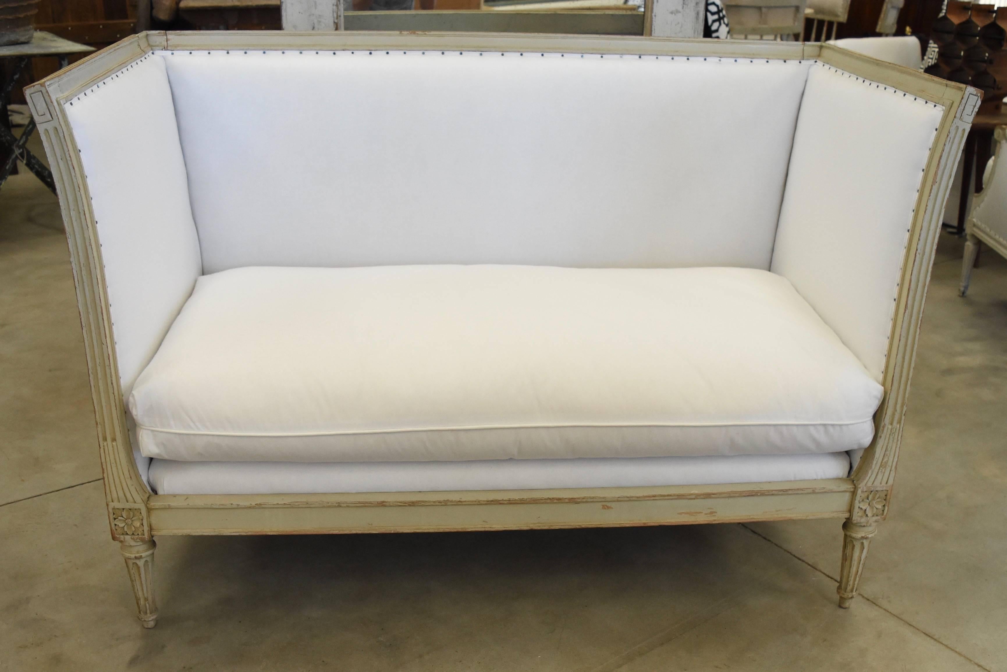 This super chic Napoleon settee from France has been newly upholstered in muslin and has a single down filled cushion. It's modern clean lines go in any decor.