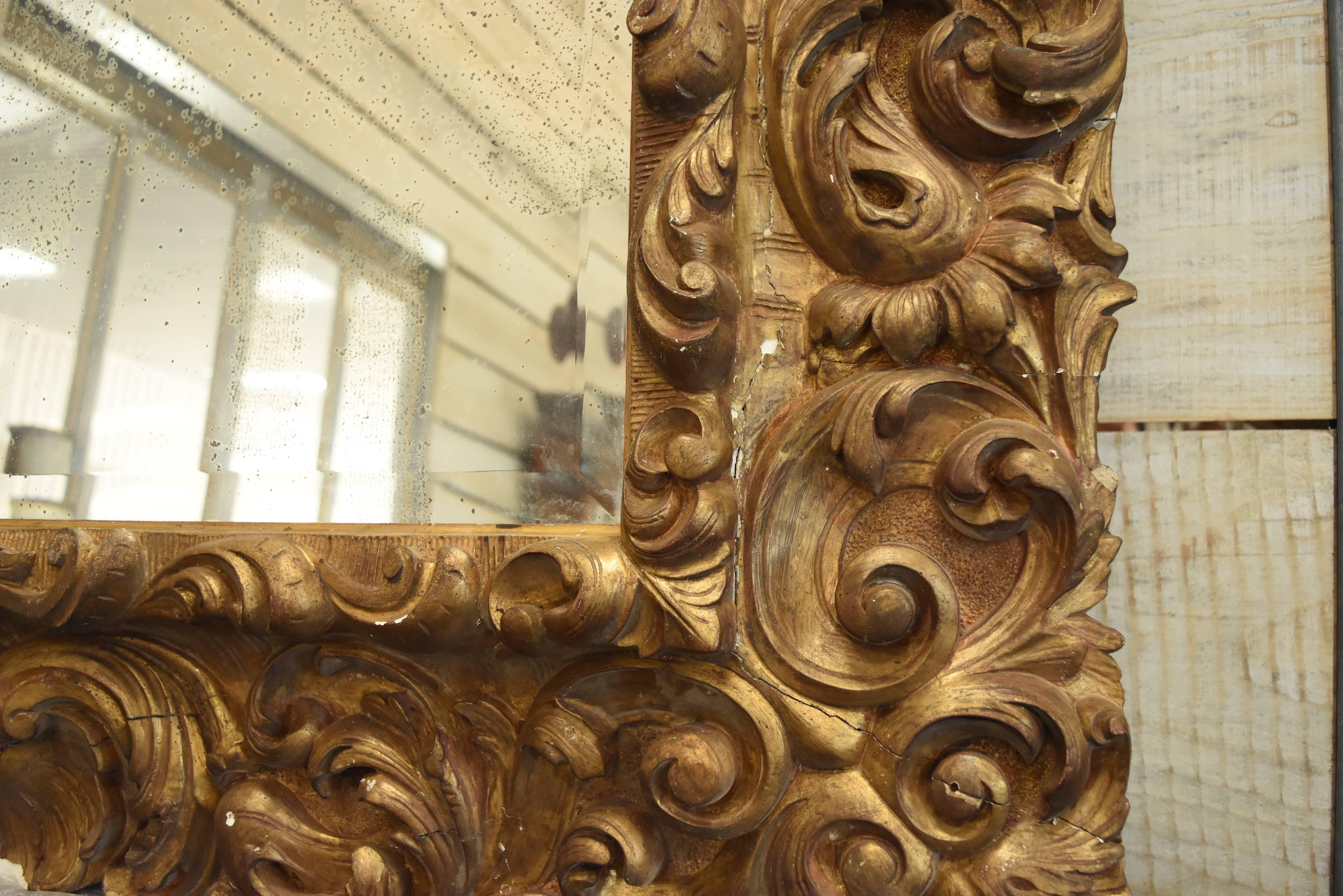 Hand-Carved Late 18th to Early 19th Century Gold Gilt Gesso Mirror From A French Castle 
