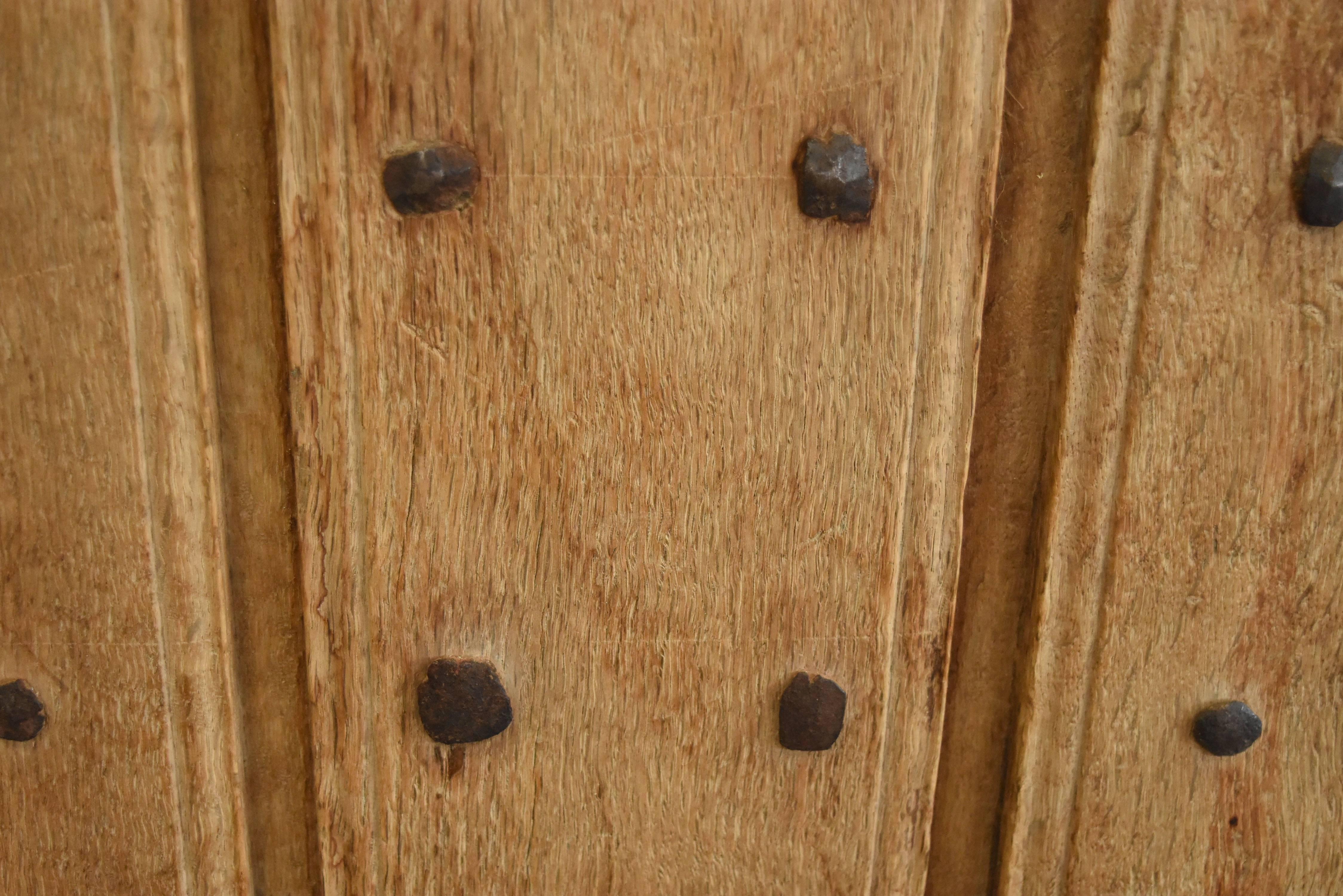 These early Spanish walnut doors still have its iron hardware and handle. They have character and charm galore and are perfect for that rustic look. Notice all the handmade nails. Imported from the Basque region in Northern Spain.