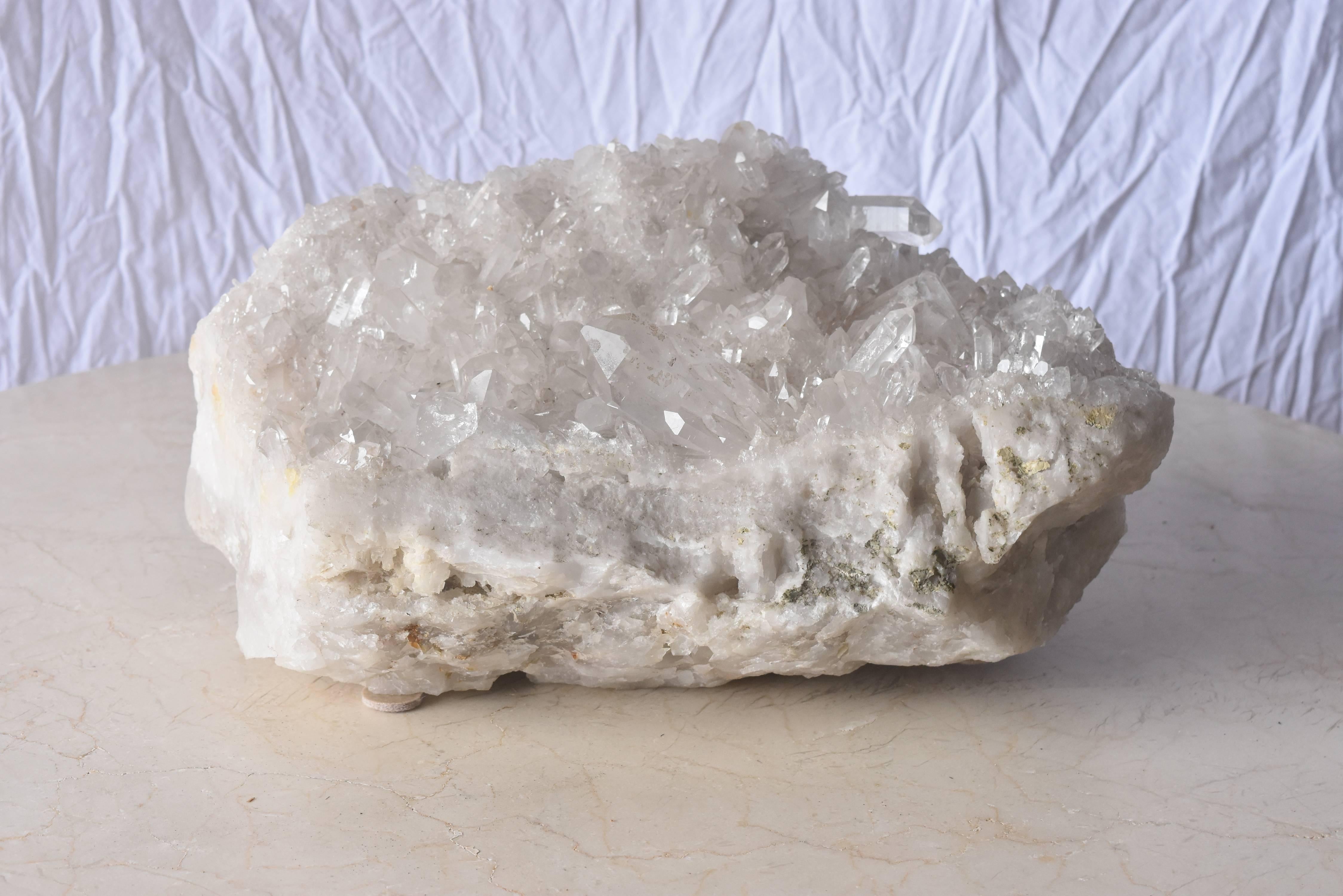 Quartz or rock crystal is known as the master healer and always great to use in decoration. This one is a wonderful coffee table or buffet piece to make a statement and give character to your room.
I am not sure of the exact date but this size can