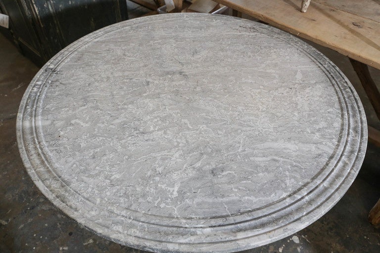 1920s round pedestal table from French, stone base with later top.