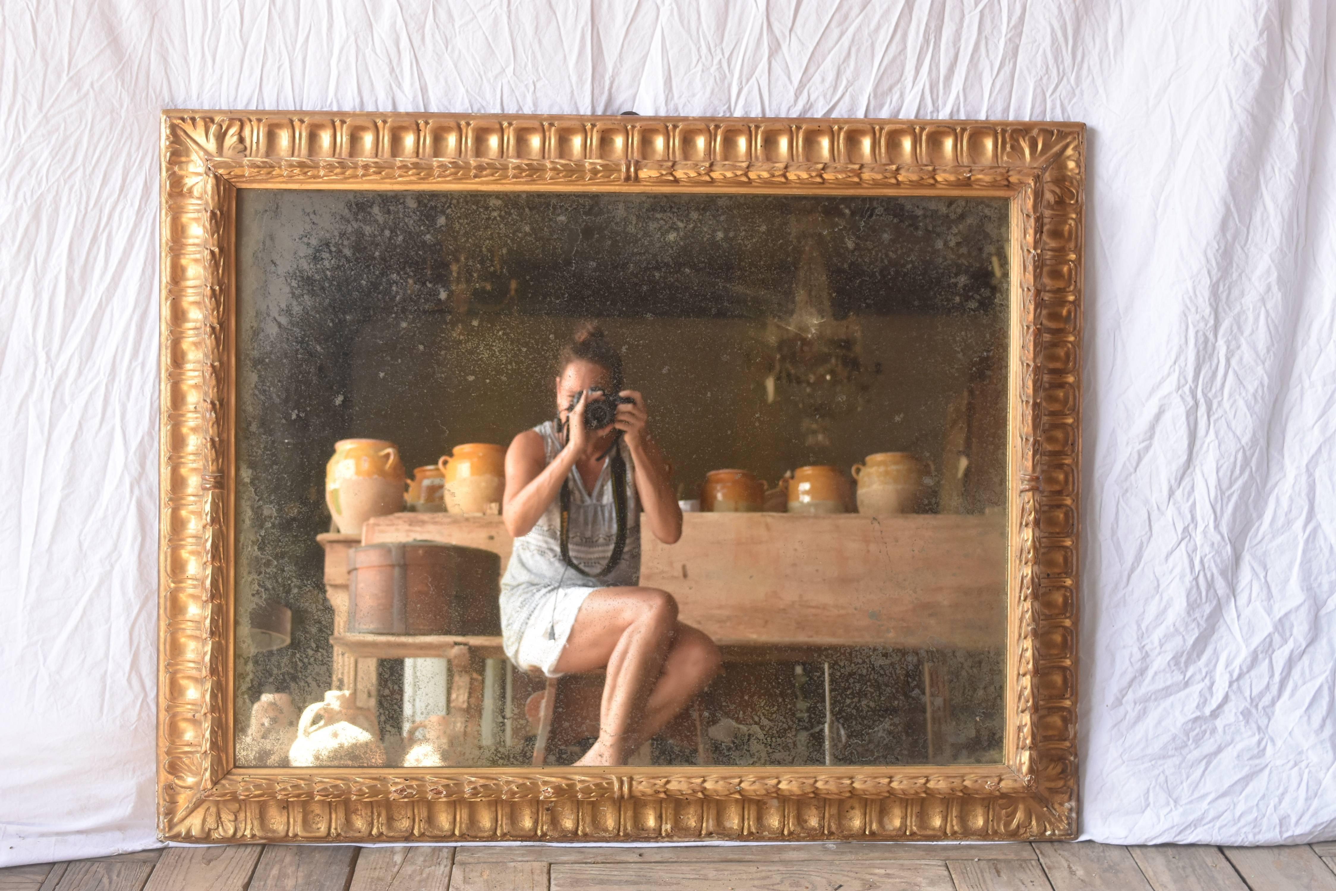 This Italian gilt frame is in very good condition and could be used horizontally or vertically. It originally had a painting in it and has been repurposed as a mirror.
  