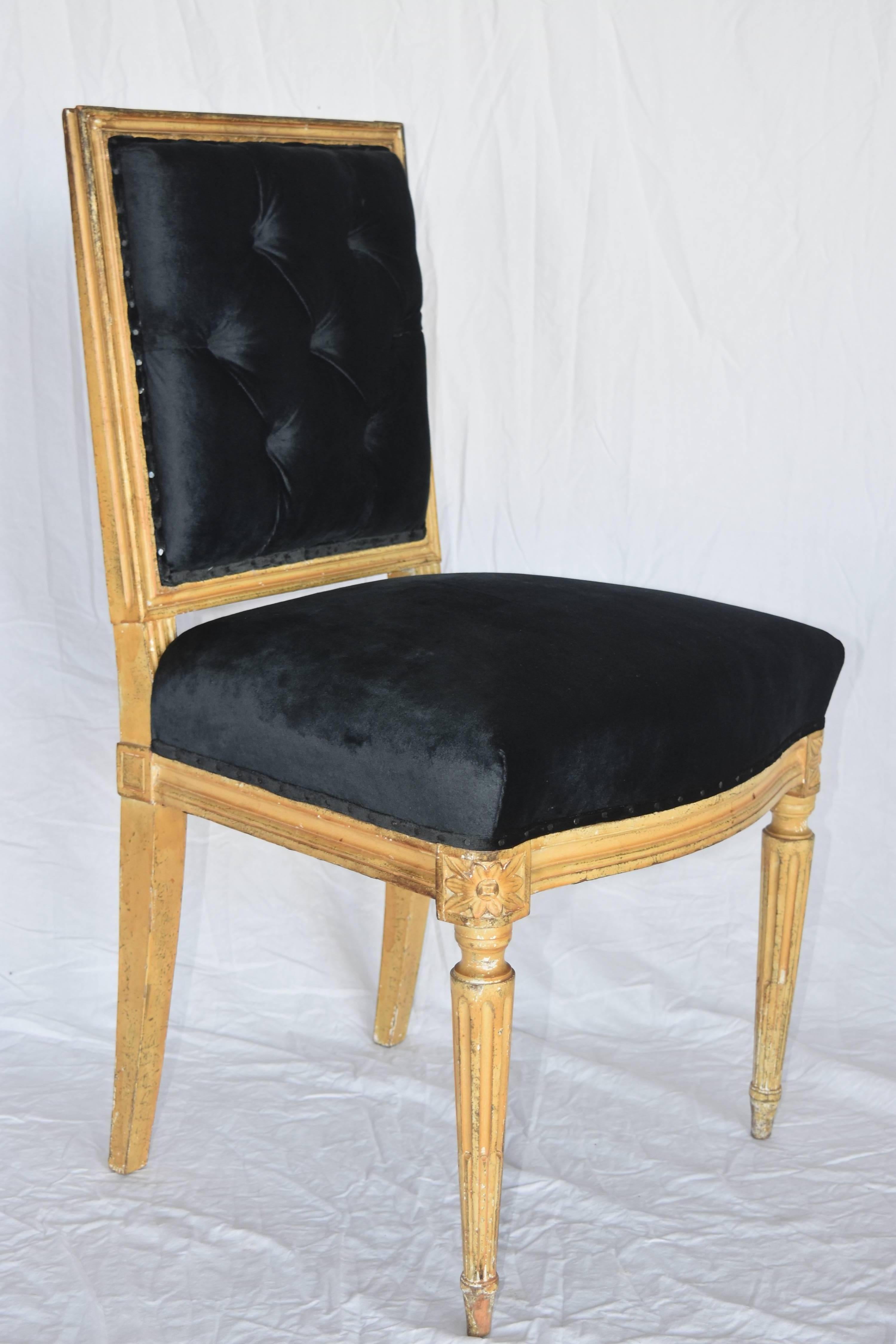 These stunning dining chairs are from Paris, France and have been newly upholstered in black velvet fabric with tufted back.  They are a great height and plenty of seat room for comfort.  They feature a wonderful hand rubbed patina that is darken