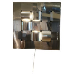 Light sculpture/large stainless steel wall lamp, Reggiani, 1970s