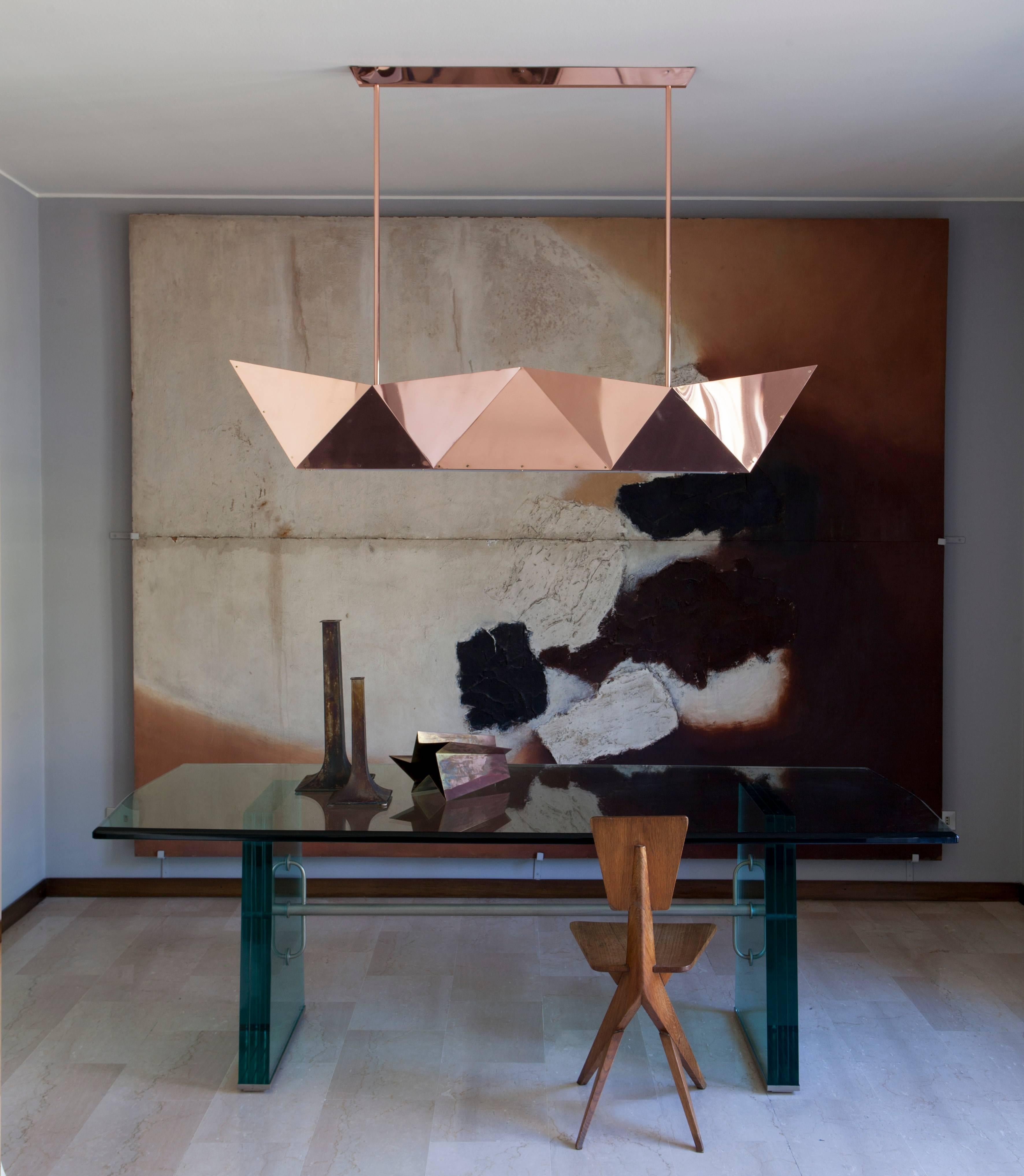 Deriva is a hanging lamp with direct and indirect LED light, an evolution of the ceiling light fixtures especially designed for Fragile's new location in the centre of Milan. It was designed by Alessandro Mendini for Fragile Edizioni on the occasion