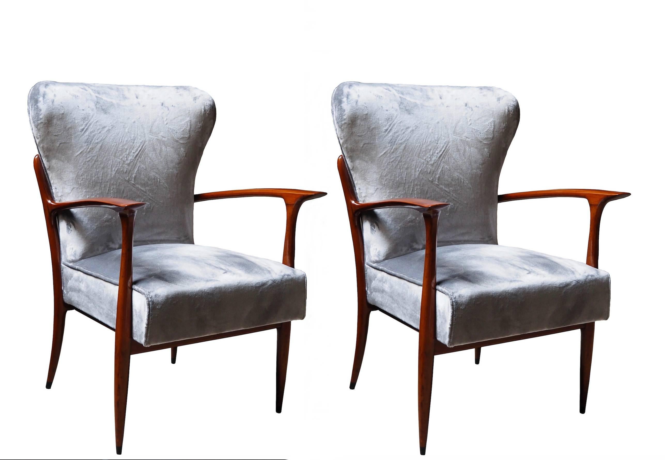 Pair of armchairs designed by Ico Parisi in the early 1950s.
Structure in cherry wood.
Seat and backrest are upholstered with grey velvet fabric.
