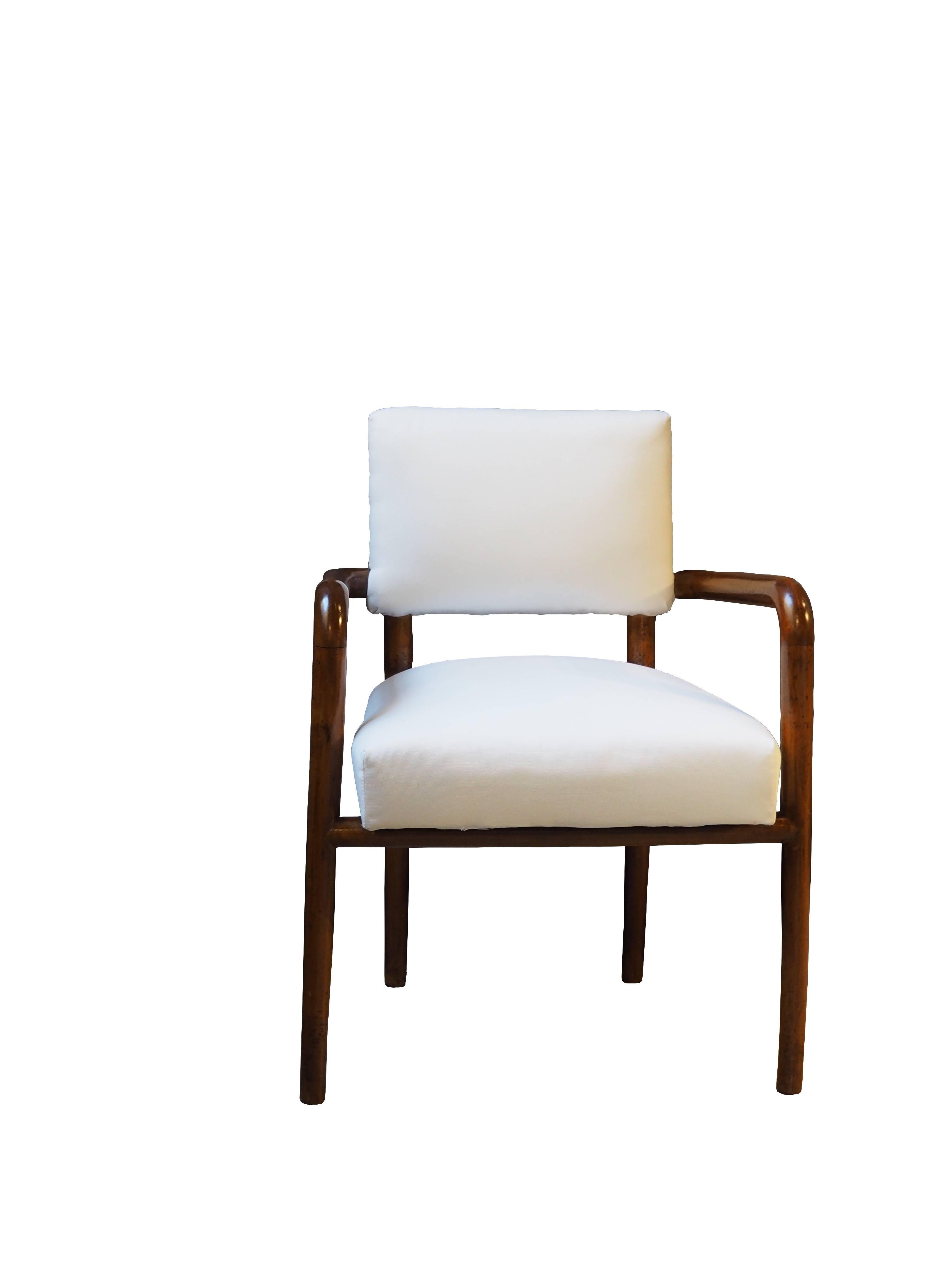 Set of four chairs and four armchairs designed by Gino Levi Montalcini, one of the most important representatives of the rationalist movement in Italy. These chairs has been realized in 1938 for Casa Pastore in Turin and made of pear wood and