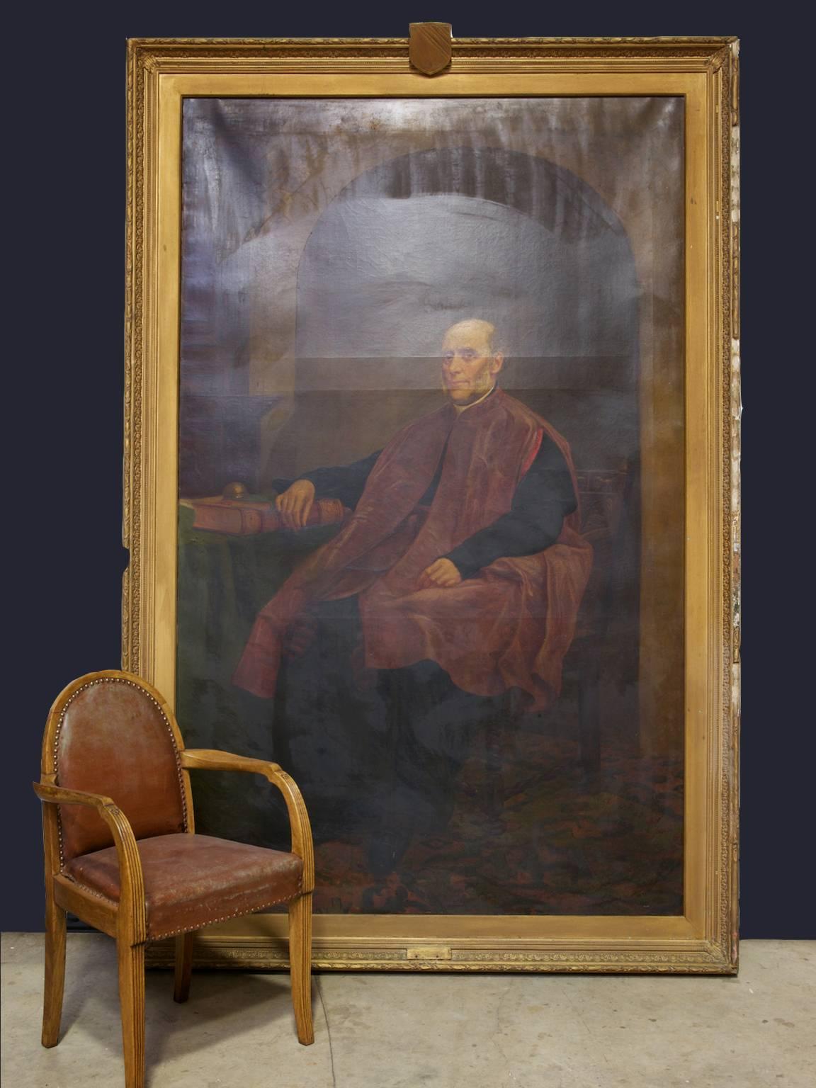 A oil on canvas portrait of a clergyman in robes seated at his desk,

English, mid-19th century.
 