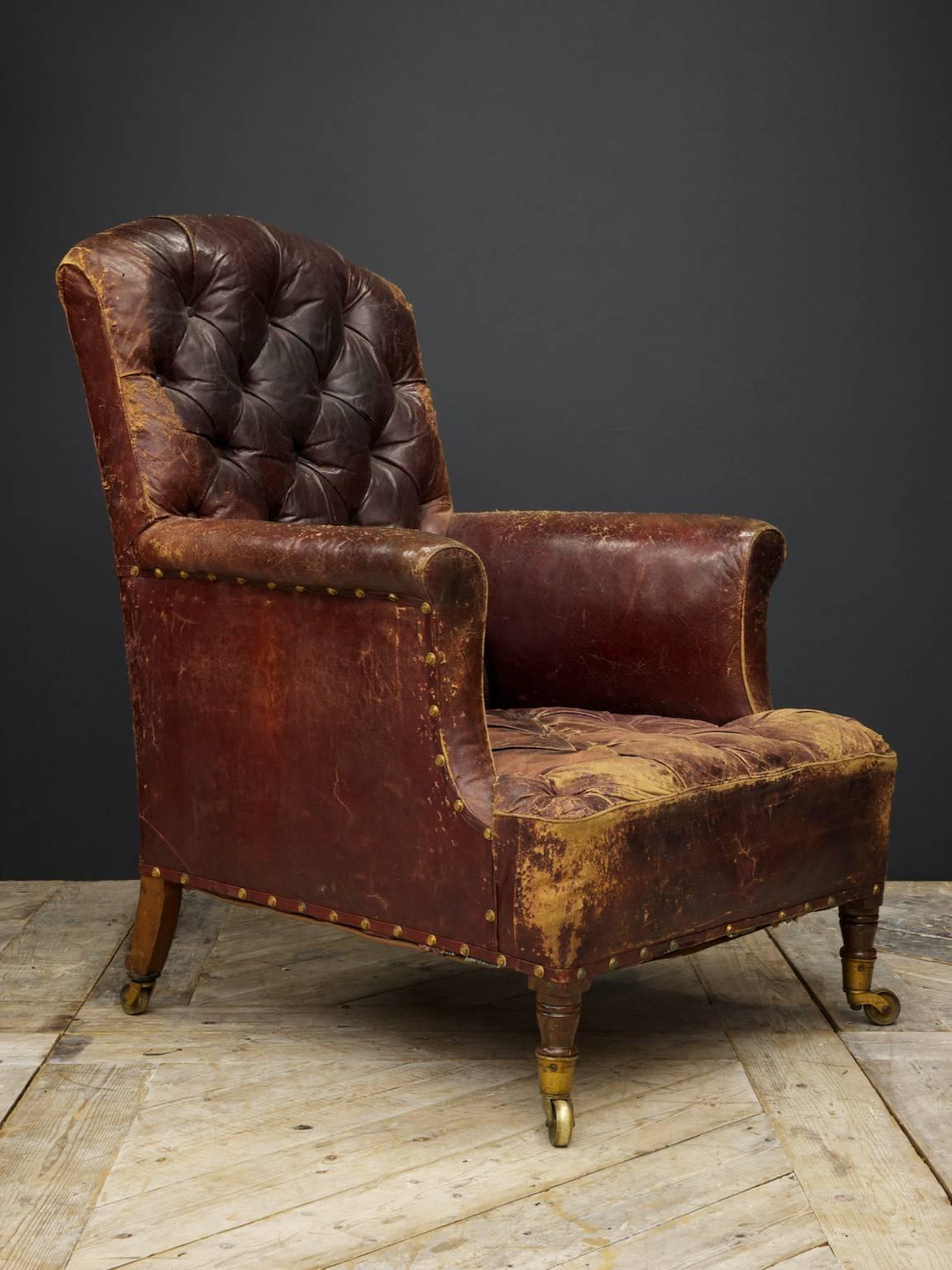 Beautifully distressed leather armchair,

English, circa 1860.