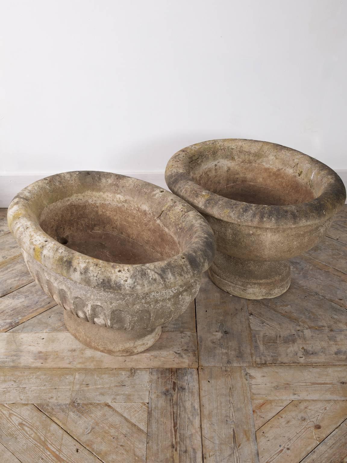 Two Carrara marble 17th-18th century cisterns.

The fluted and gadrooned shaped body set on an oval foot is £5800.00

The smooth example is £4200.00 

Fluted is 40cm or 15