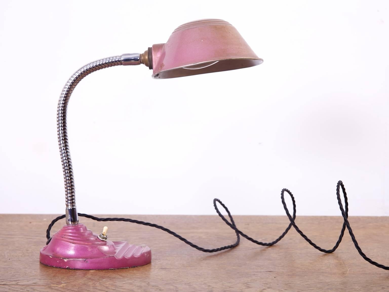 An adjustable desk light In a highly unusual color.

The shade has faded but the base remains vibrant.

English, 1930s.

Rewired and pat tested.